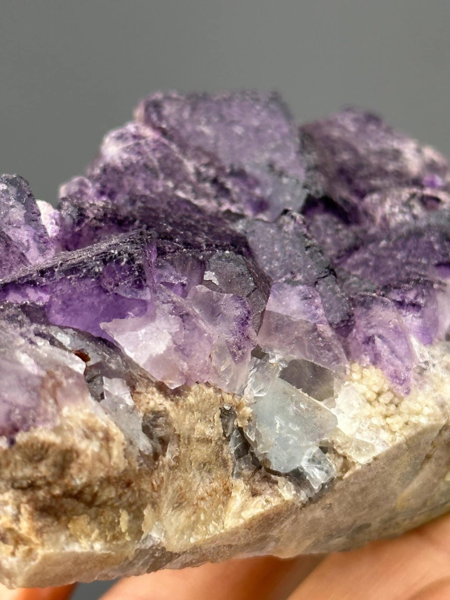 Close-up of purple fluorite crystals showing vitreous luster
