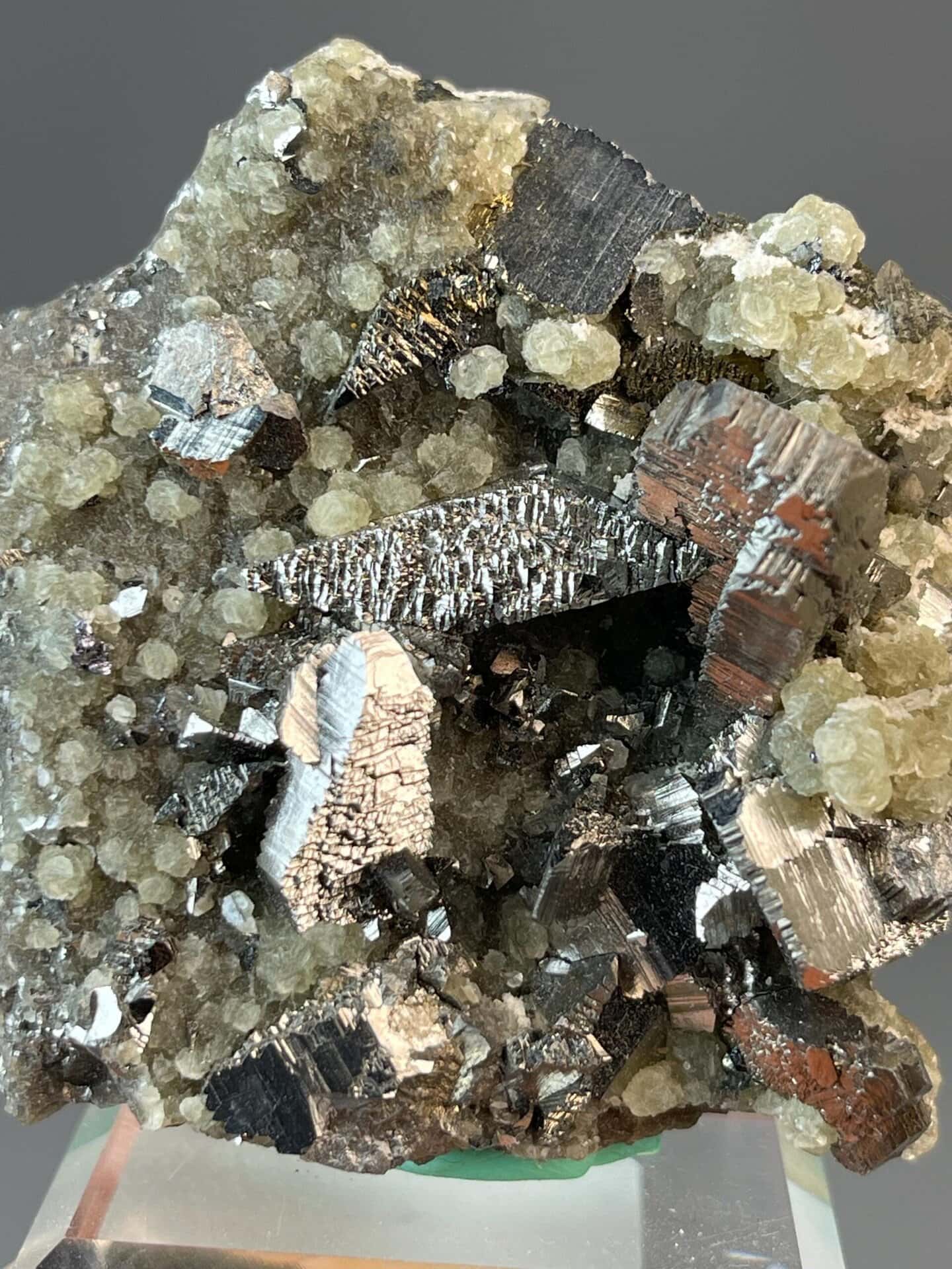 Chalcopyrite showing iridescent color play with pyrite association