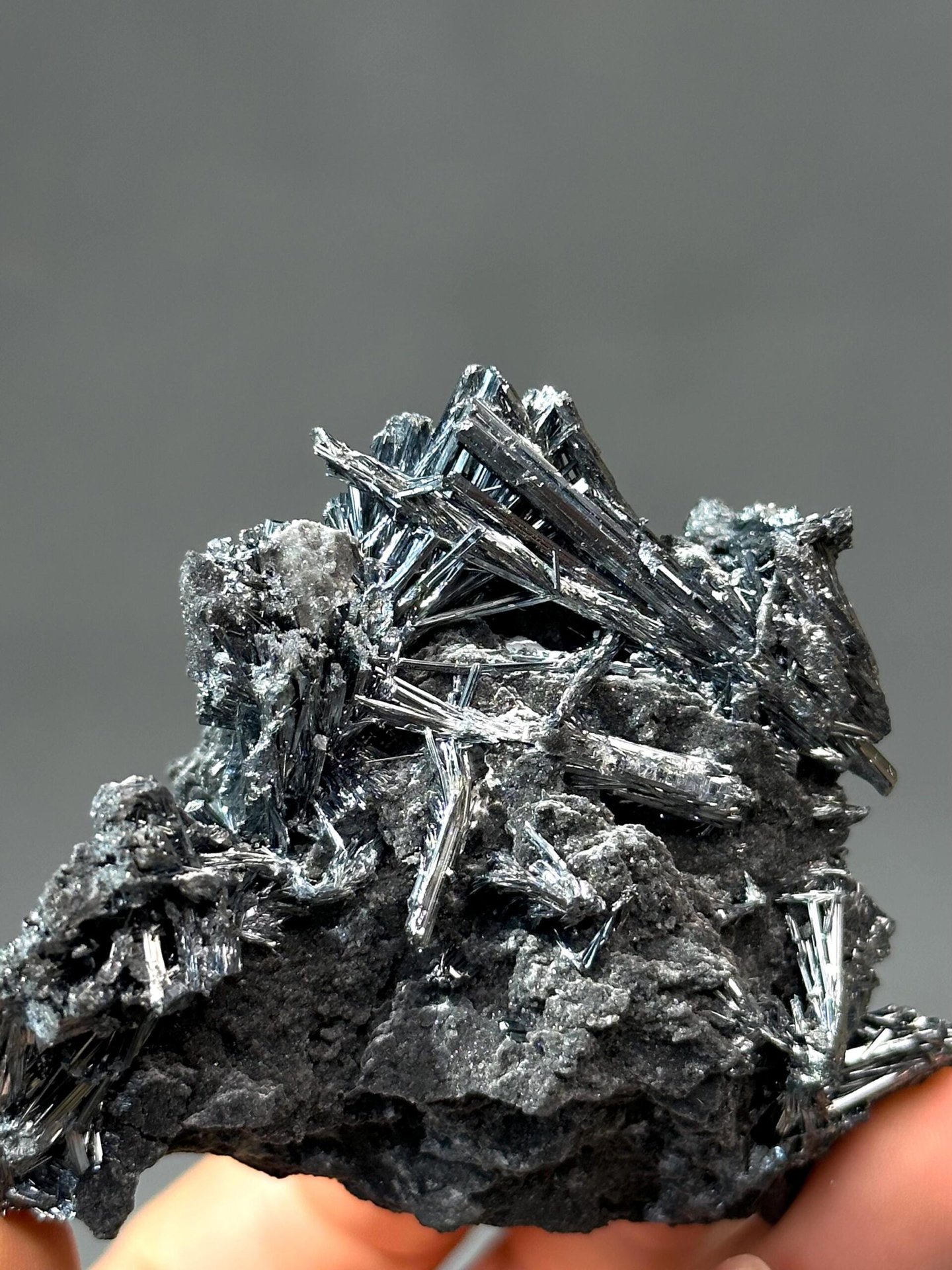 Metallic striated stibnite blades detail close-up
