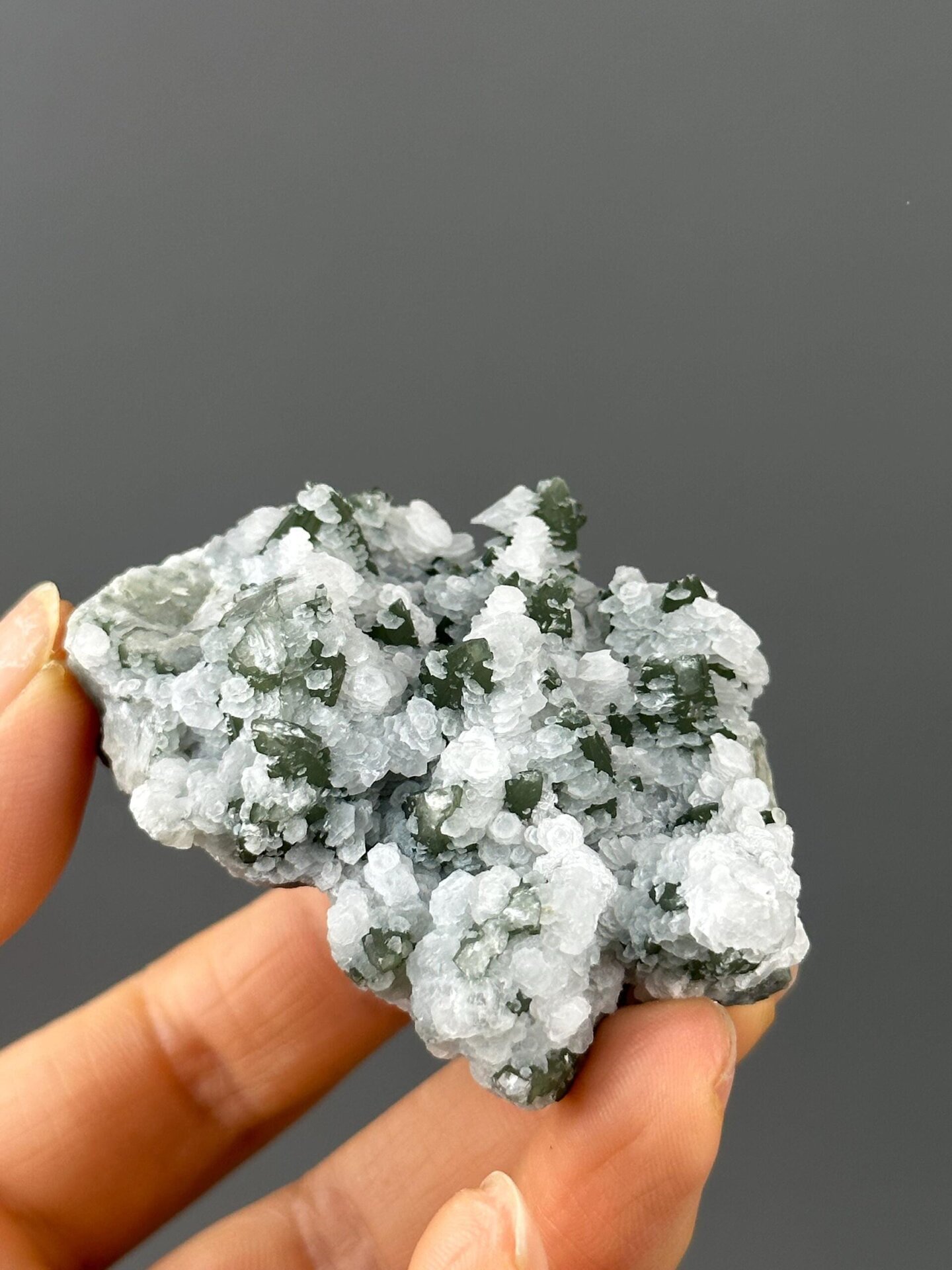 Angled view of flower calcite with green quartz