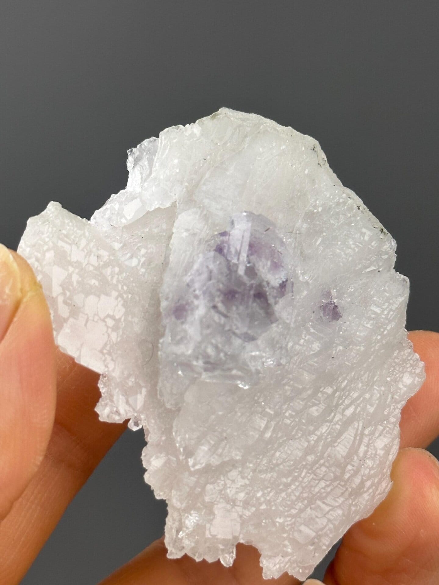 Fluorite with phantom on quartz matrix close-up