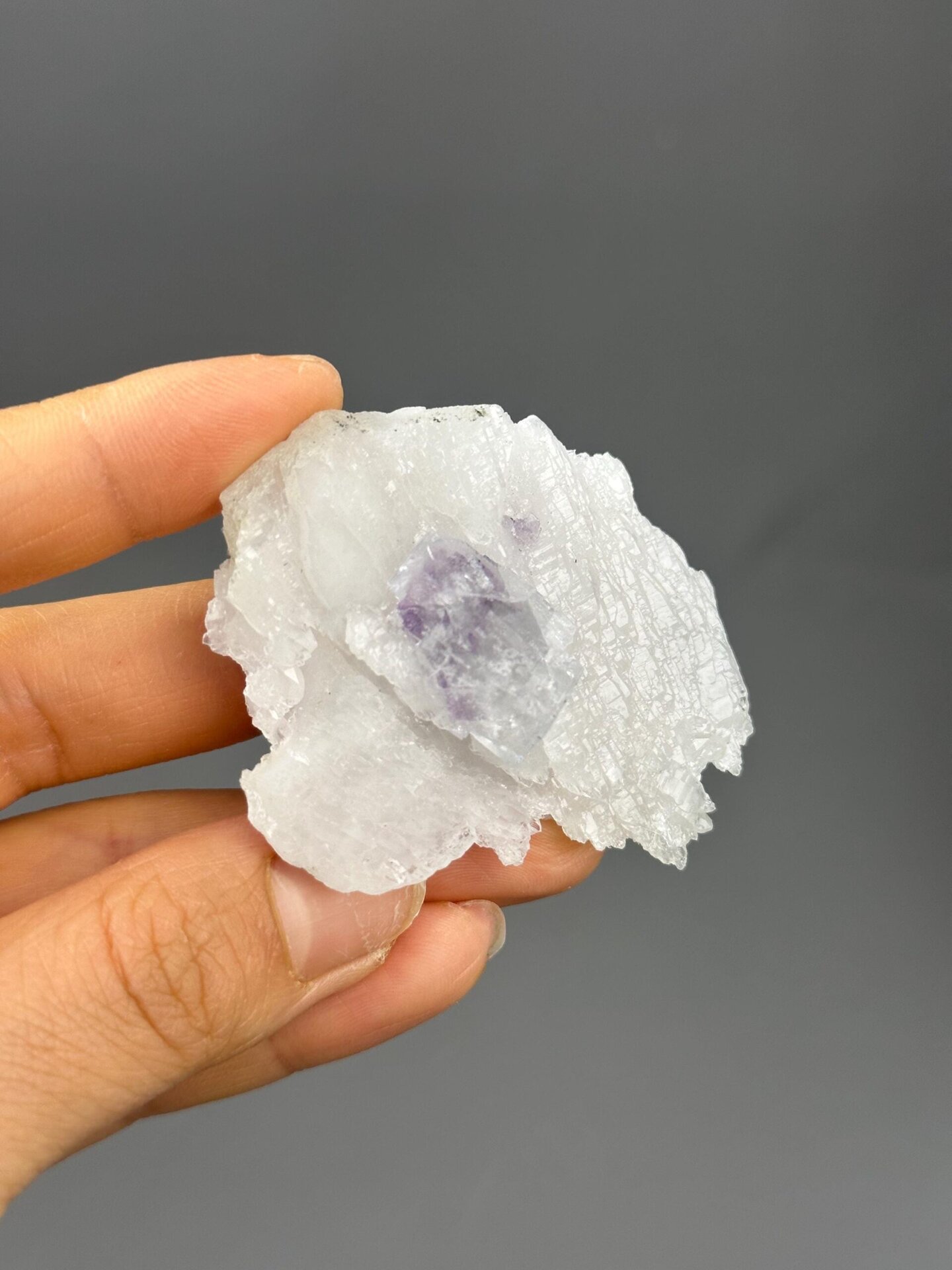 Angled view of phantom fluorite on quartz cluster