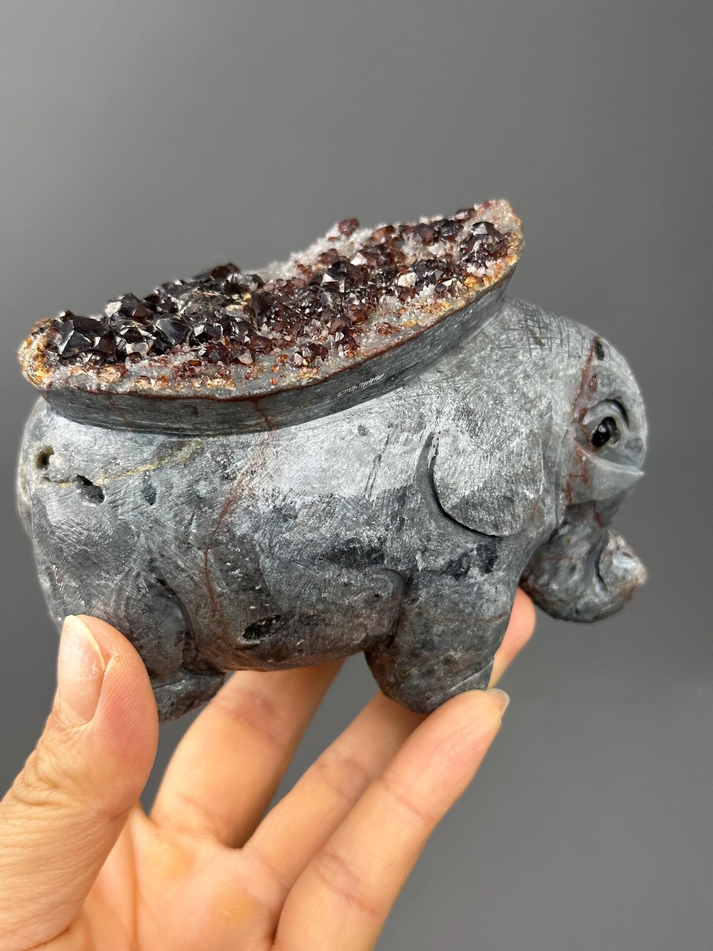 Sphalerite detail work on garnet elephant carving