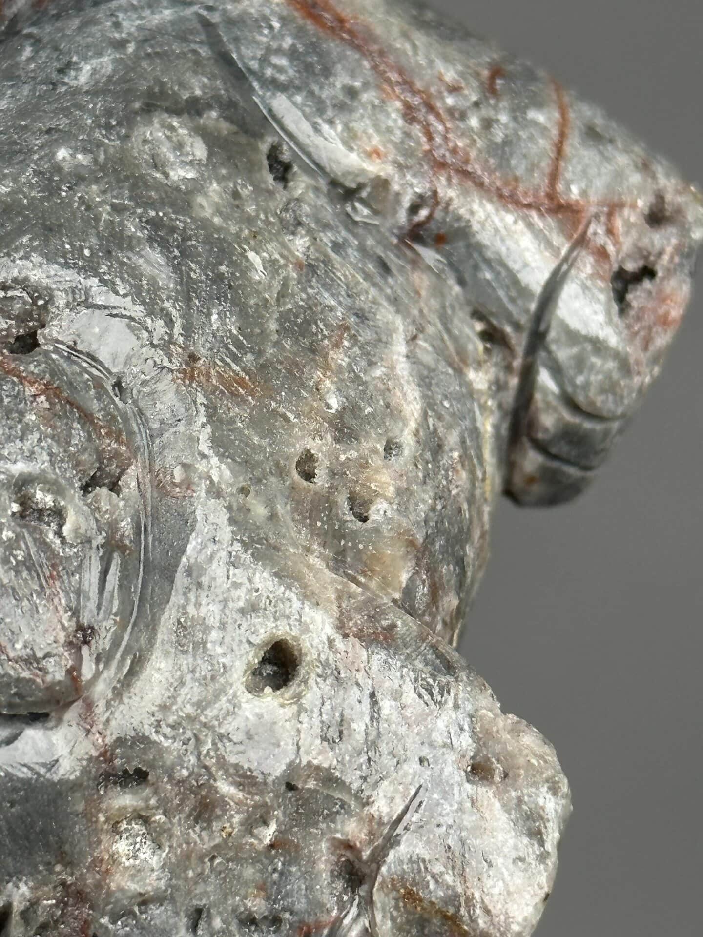 Angled view of garnet elephant sculpture