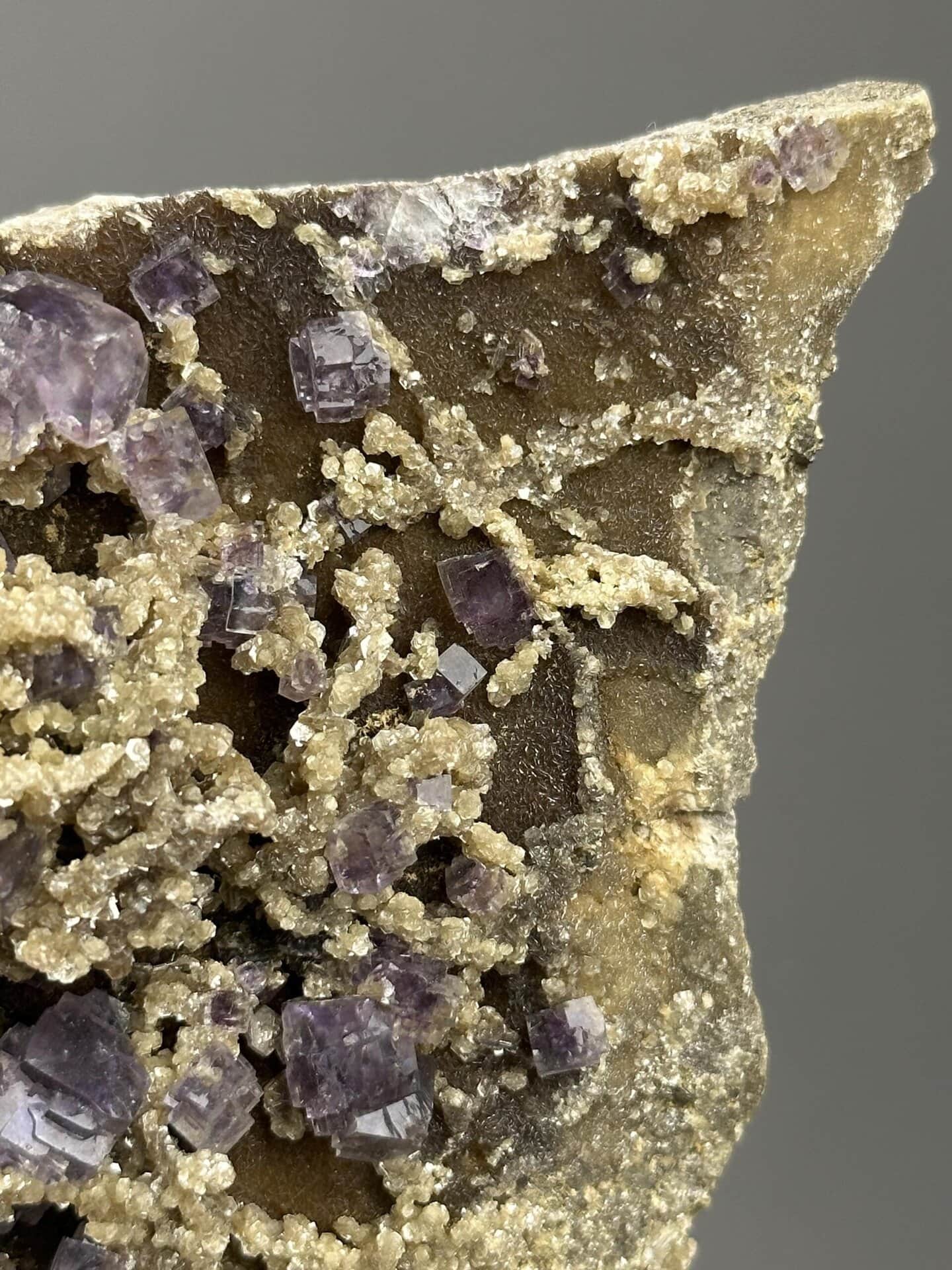 Angled view of deep purple phantom fluorite matrix