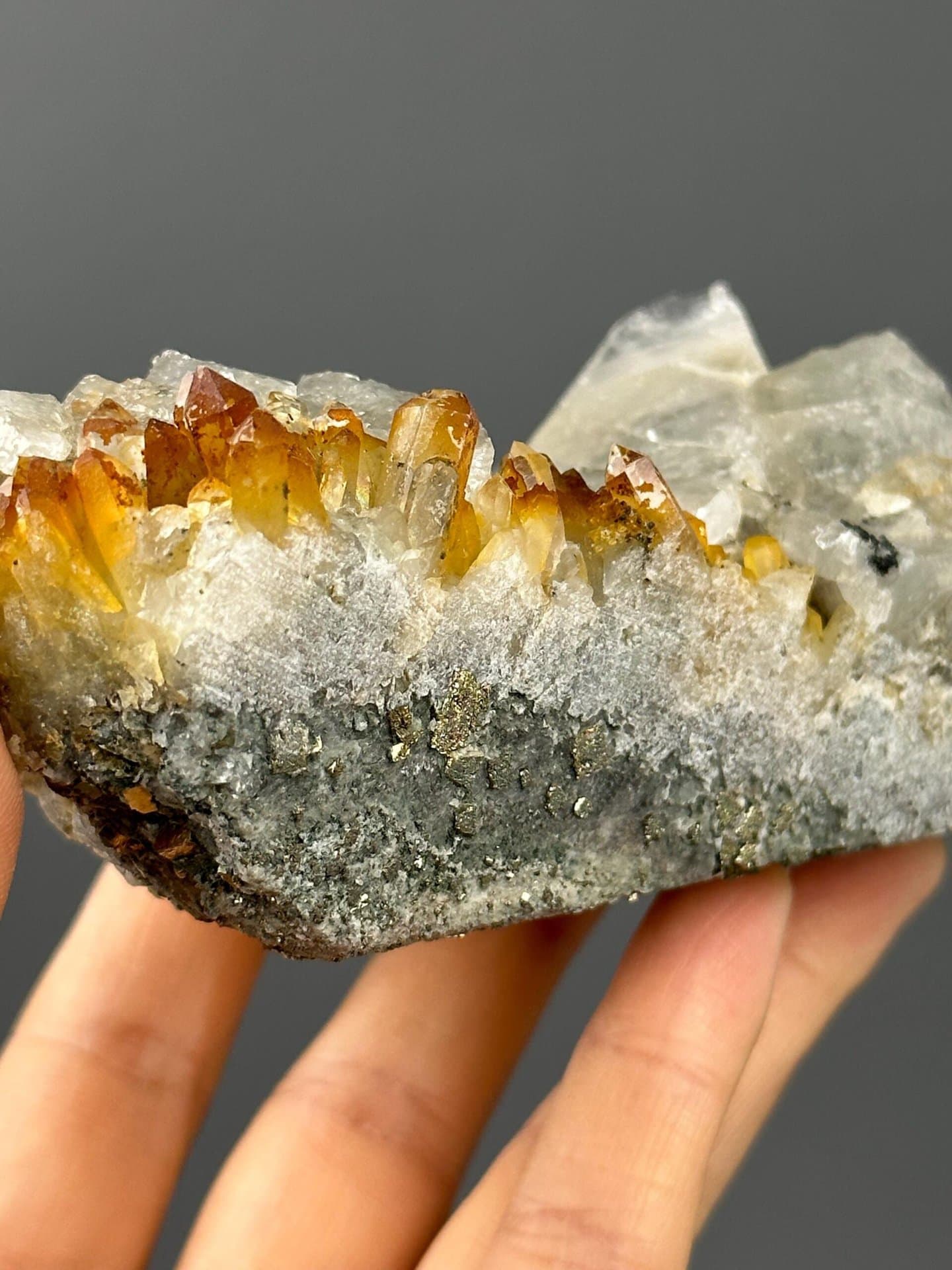 Pink needle calcite with ruler scale reference