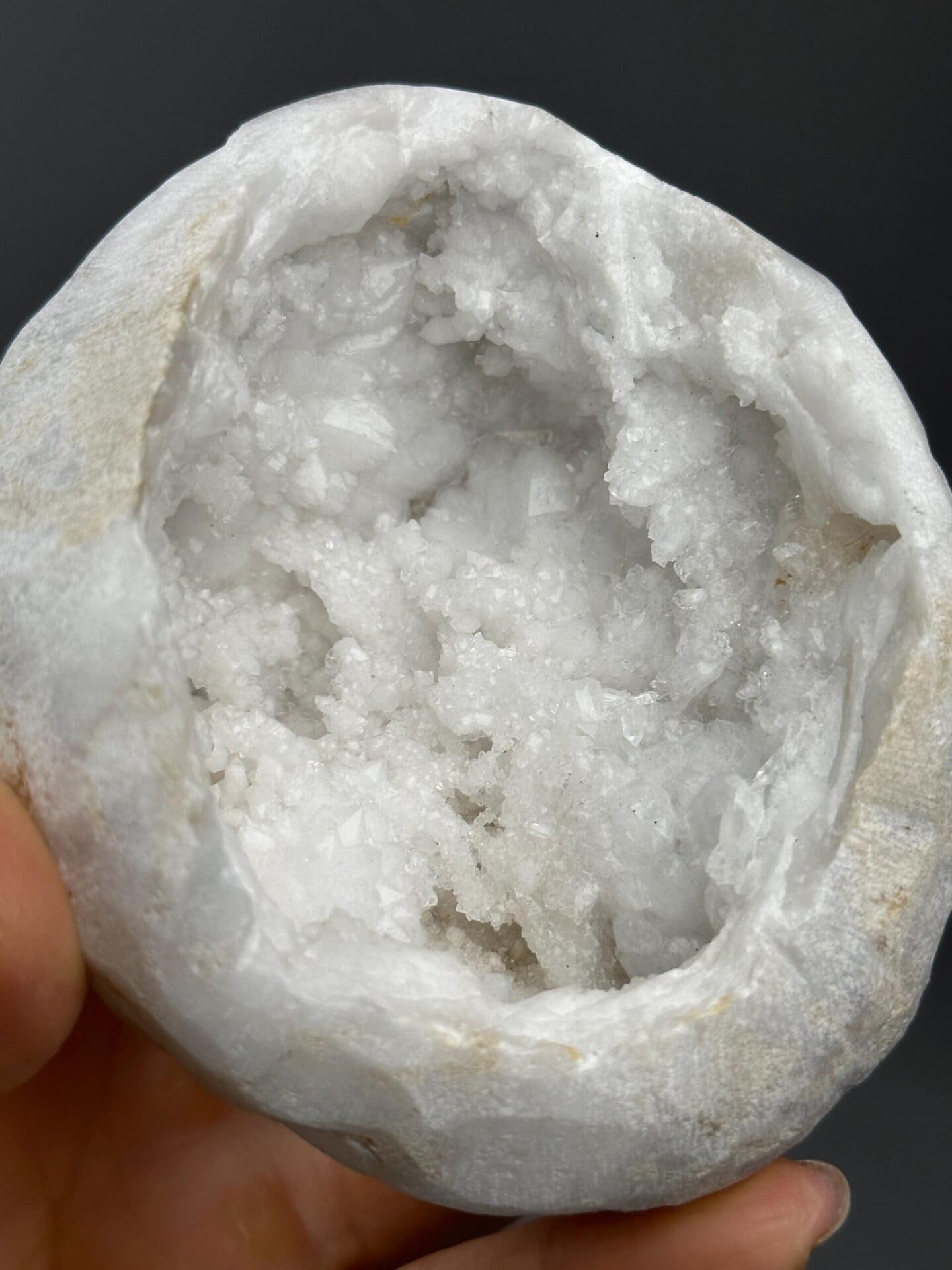 Close-up of druzy crystals inside large quartz geode