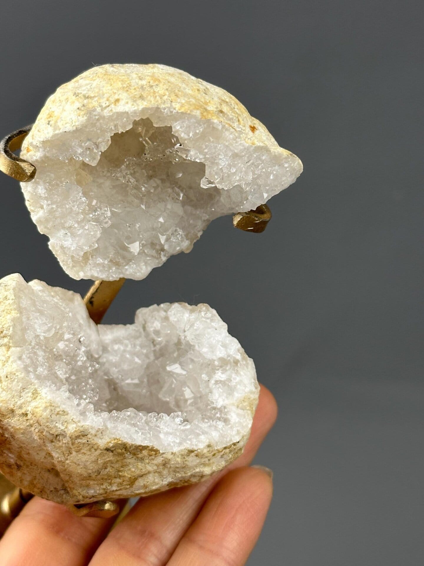 Close-up of sparkling druzy quartz crystals in hollow
