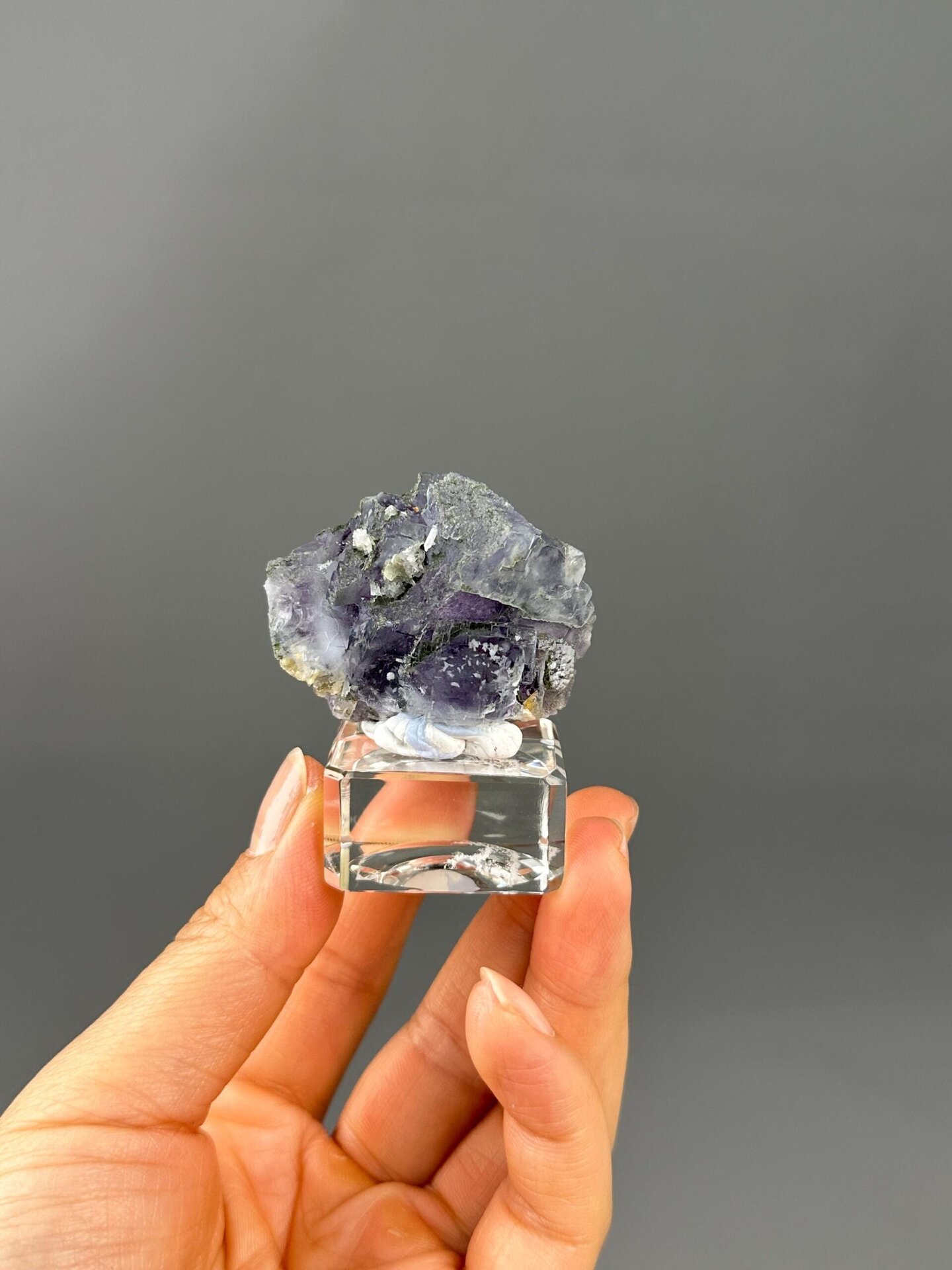 Deep purple and green hue interplay fluorite close-up