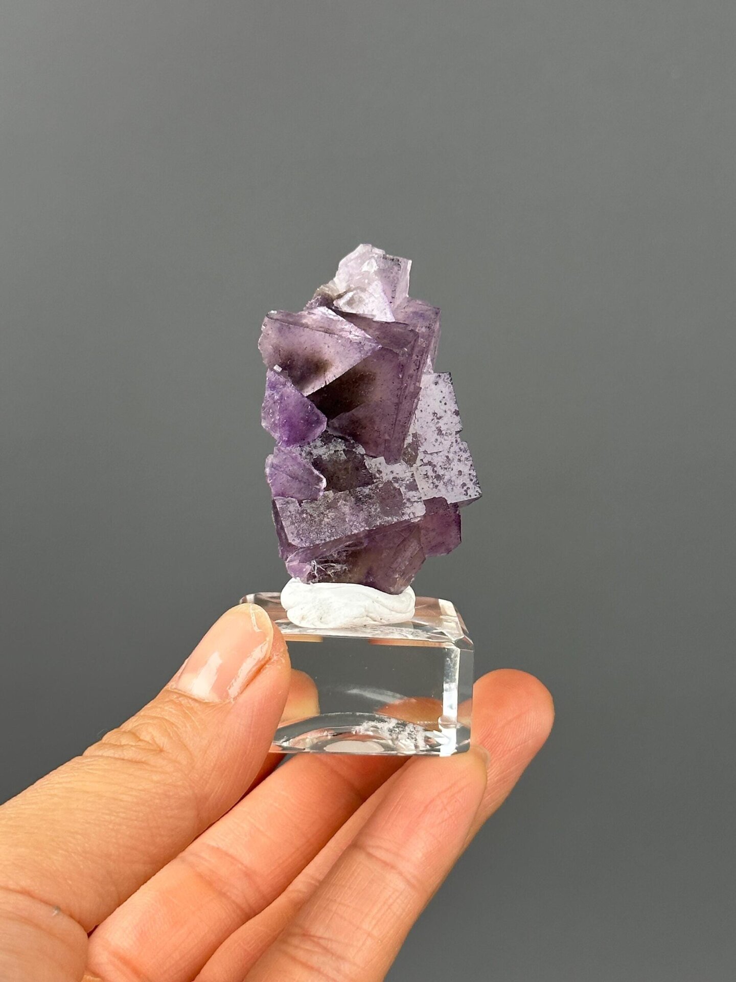 Full purple twin fluorite specimen on white background