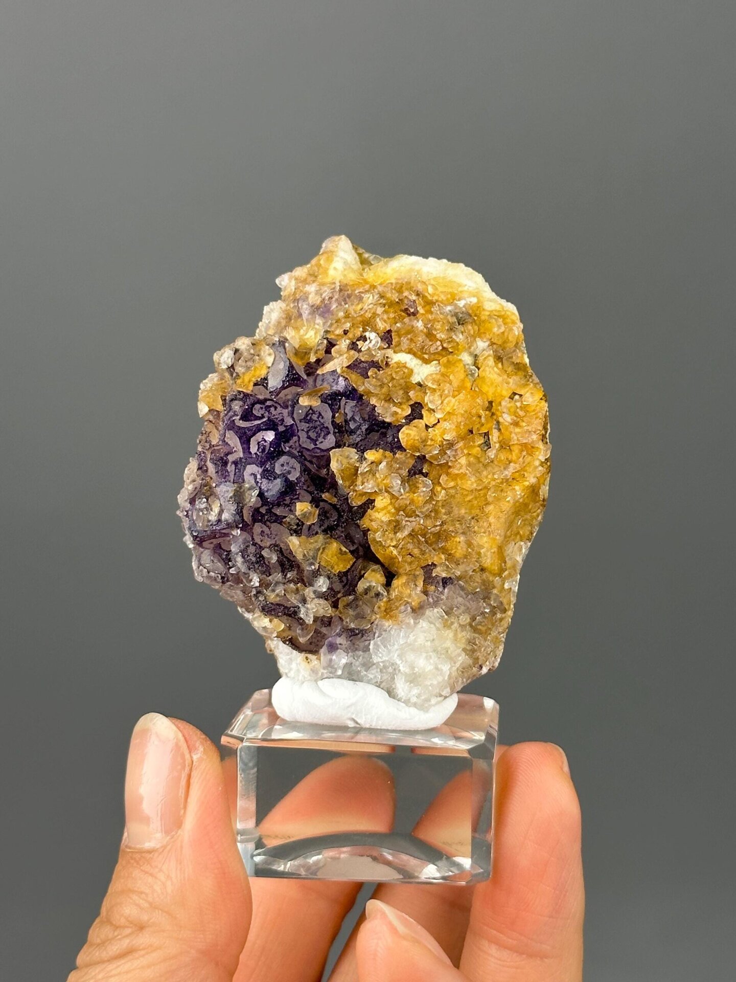 Close-up of purple fluorite and golden calcite intergrowth