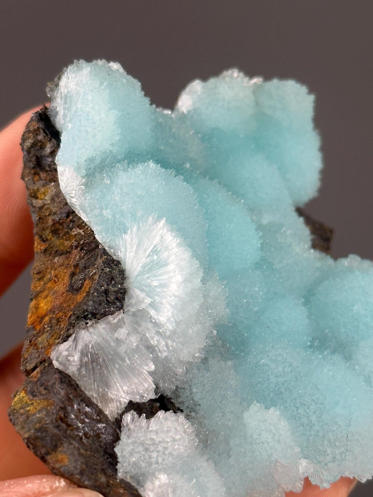 Rare blue aragonite from Yunnan under studio lighting