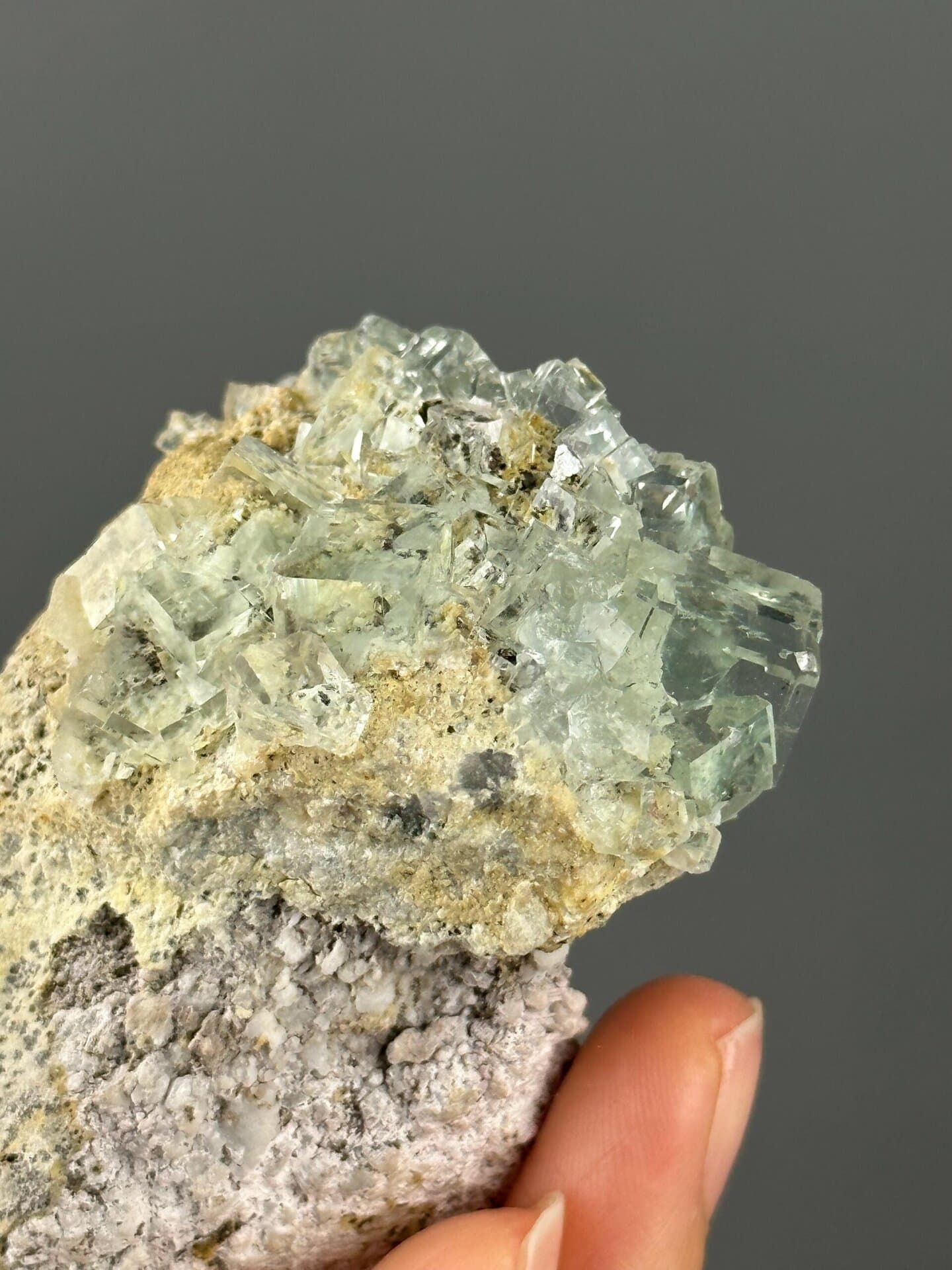 Stepped crystal growth detail on green fluorite