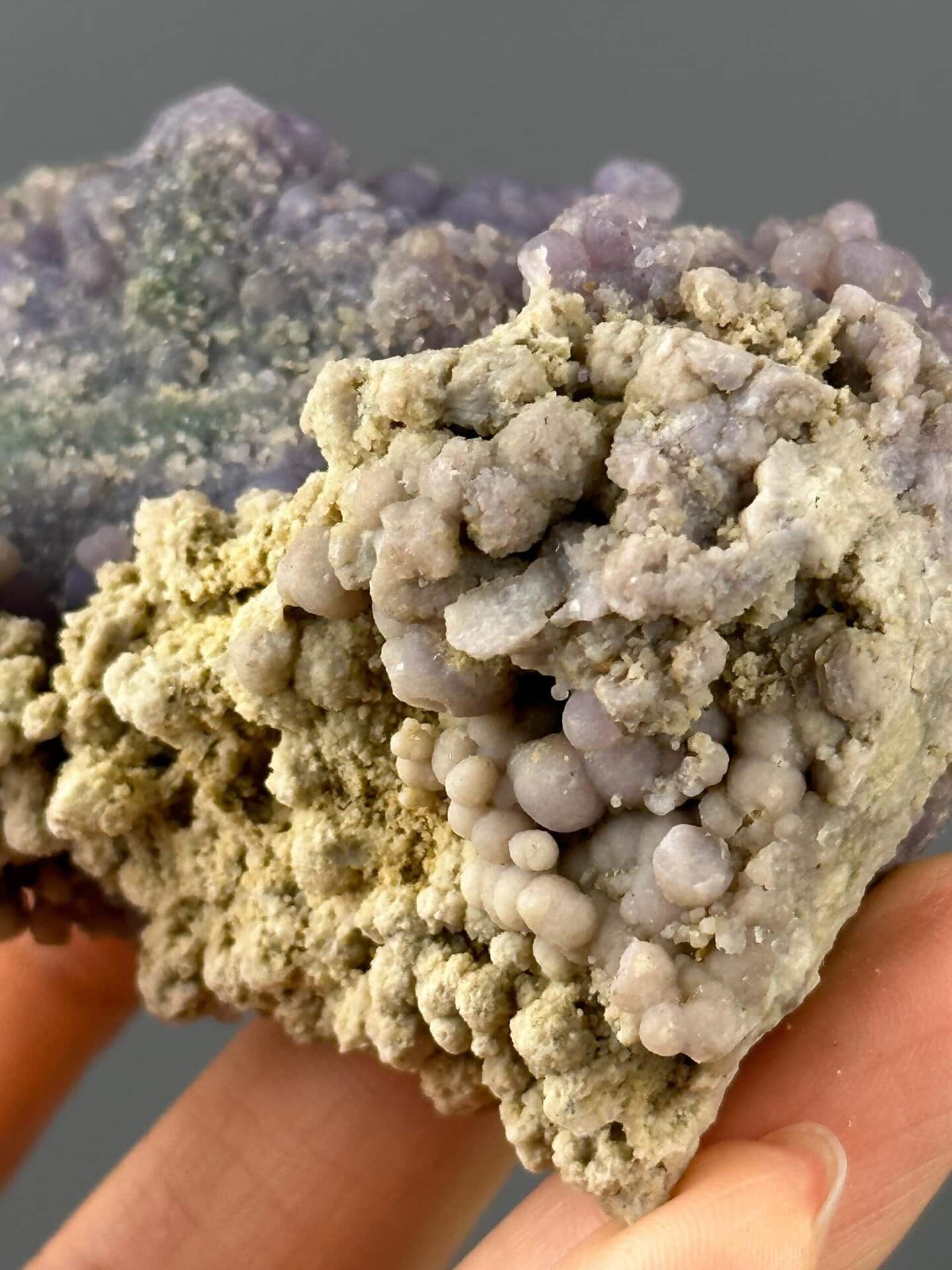 Grape agate cluster under studio lighting