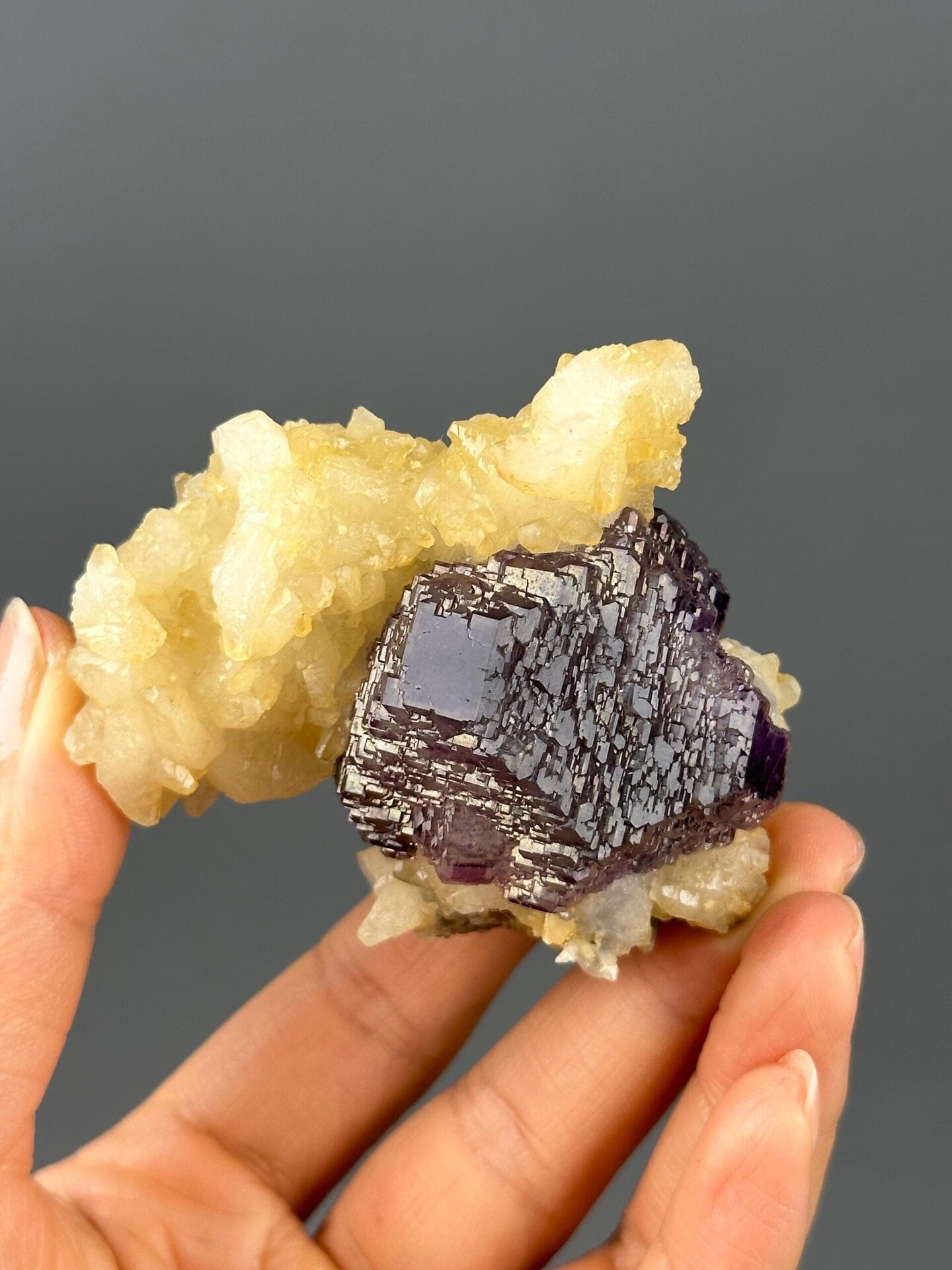 Side view of large purple fluorite cluster