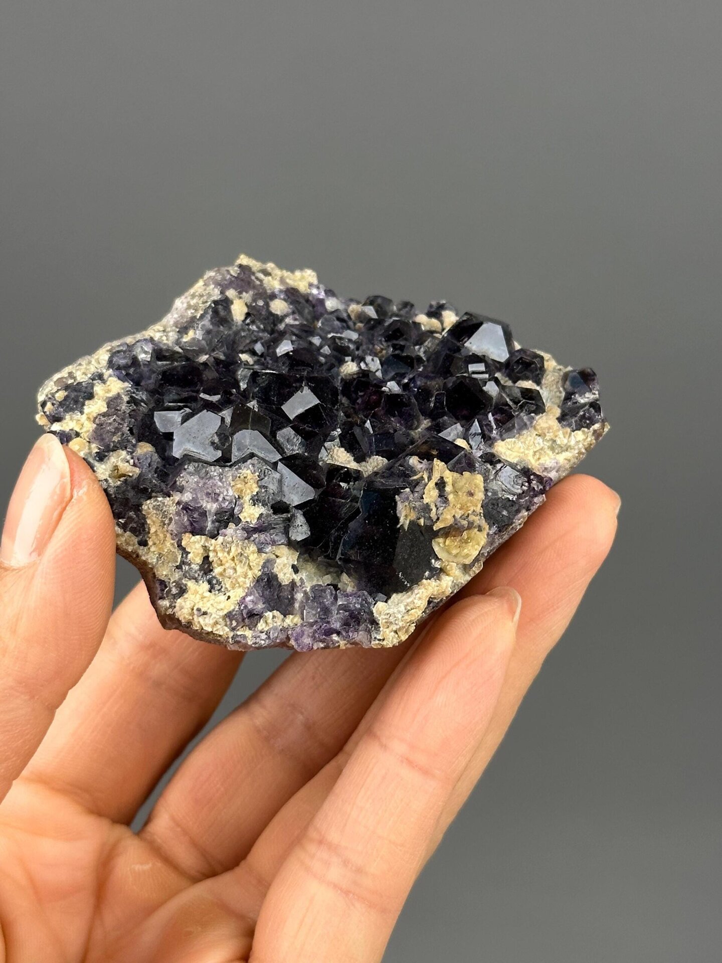 Deep purple fluorite cluster side profile