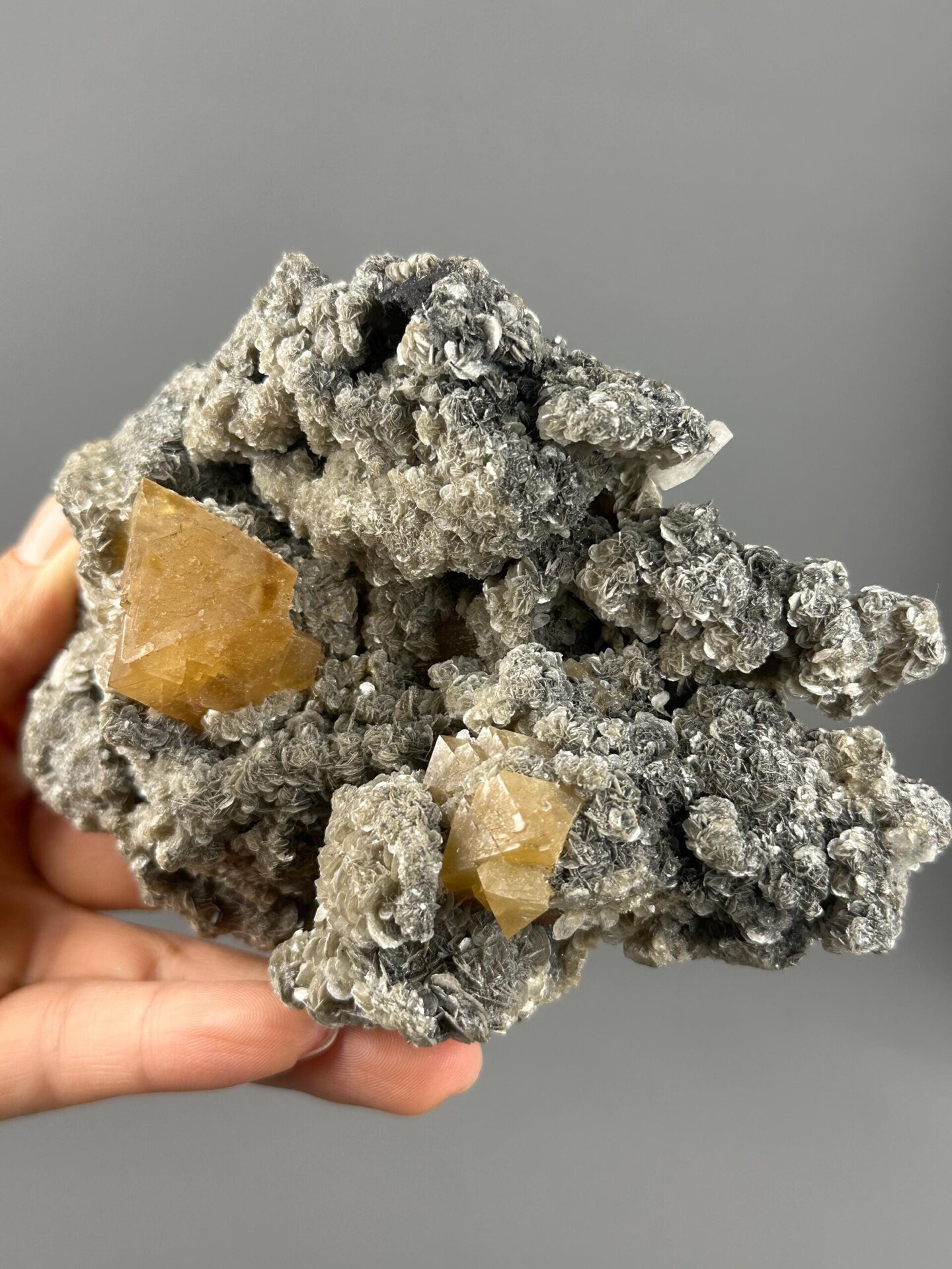 Full scheelite mica matrix specimen on white background