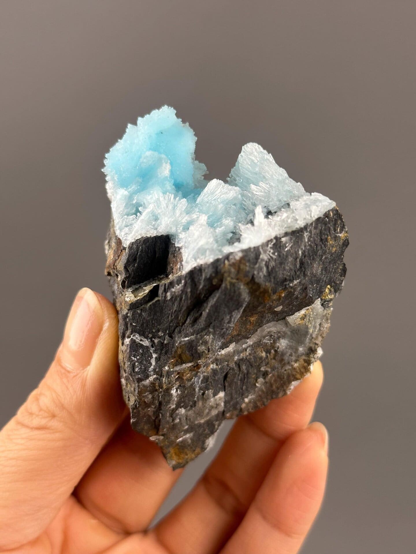 Side view of blue hemimorphite cluster showing depth