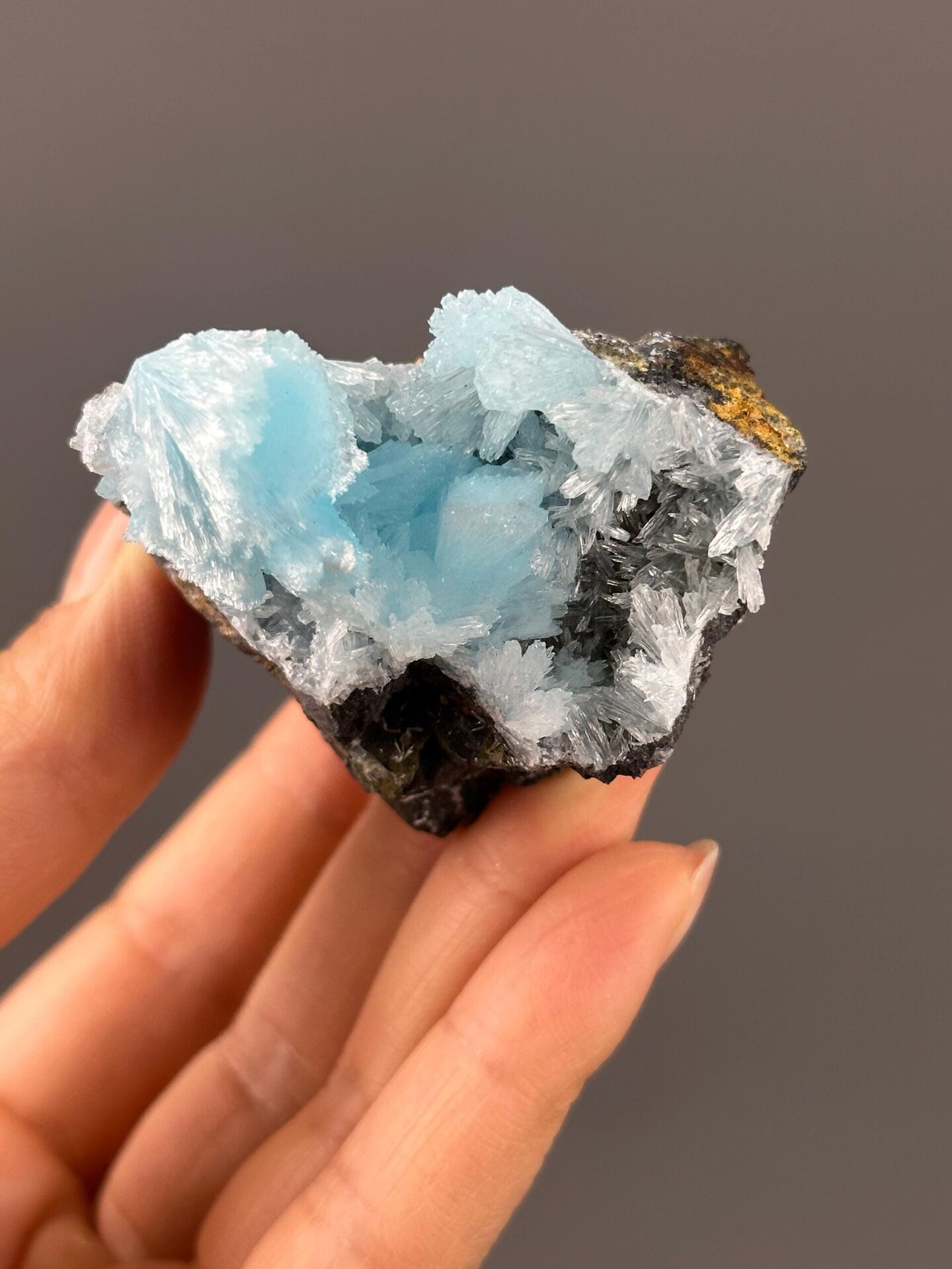 Bright electric blue hemimorphite under studio lighting