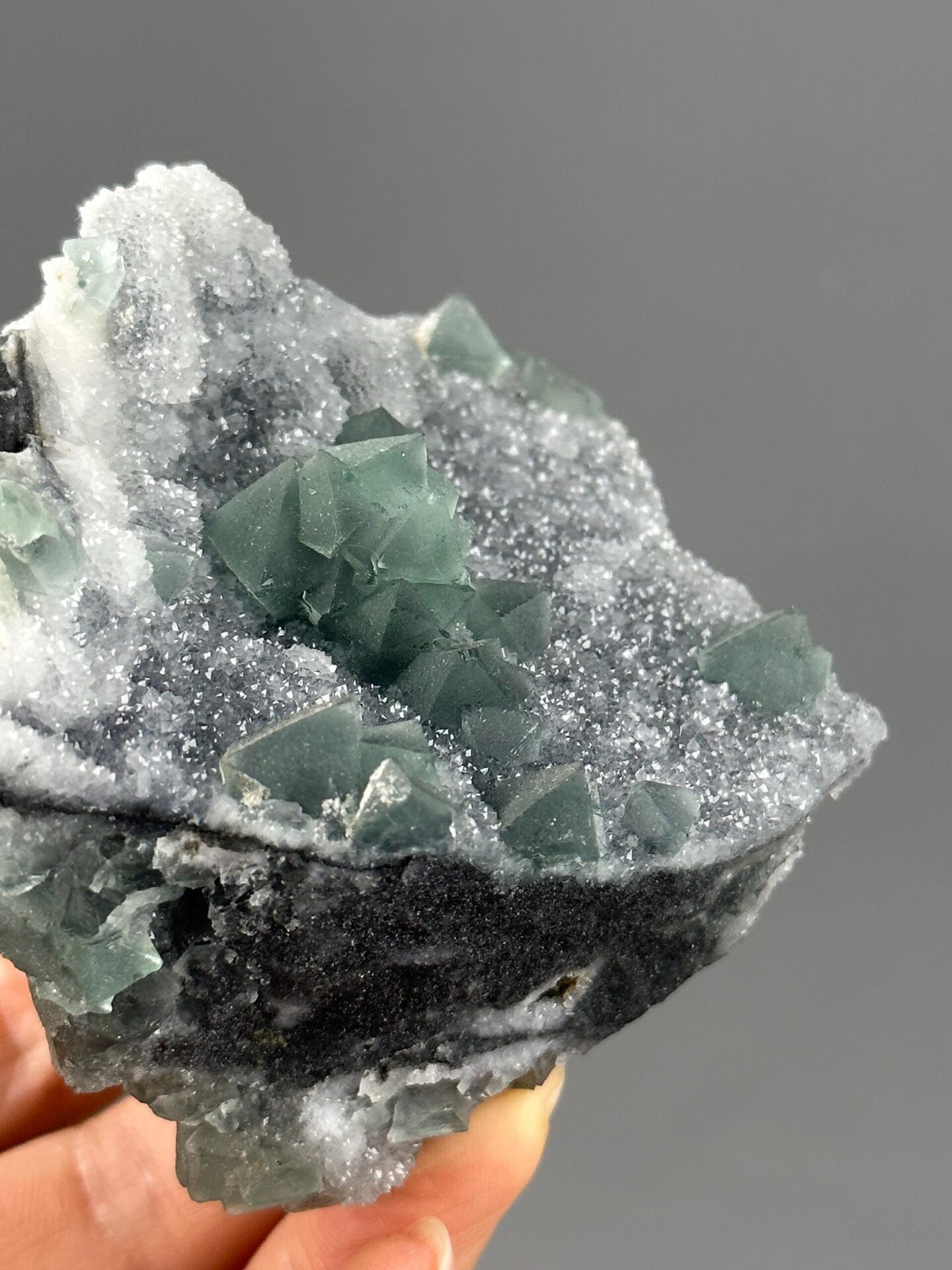 Full green fluorite quartz specimen on white background