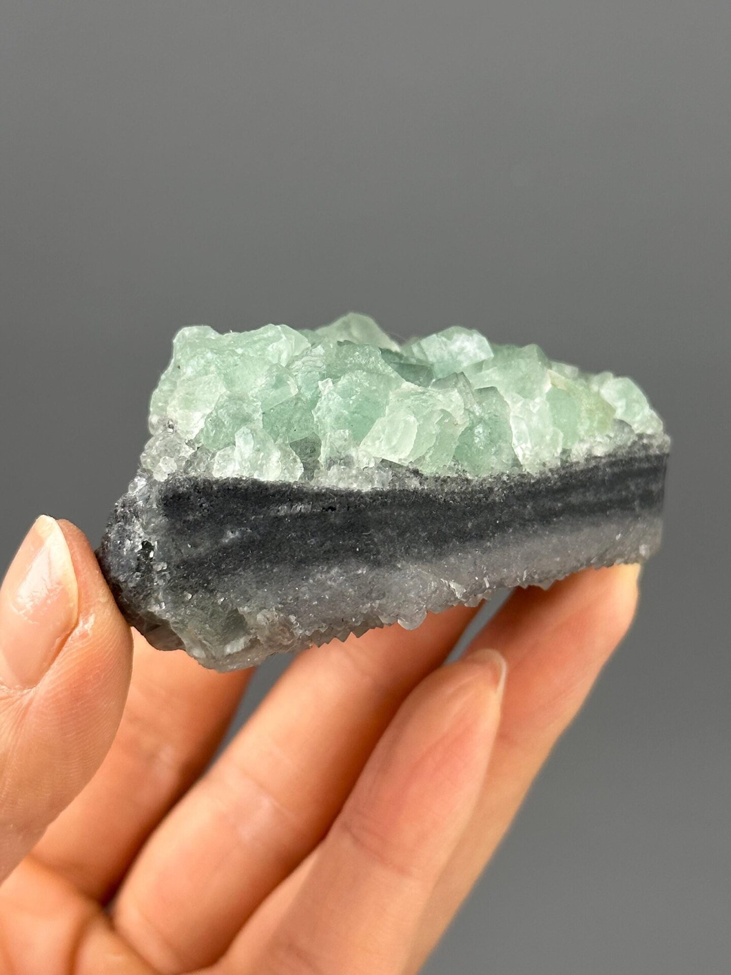 Fluorite crystal faces on quartz natural luster
