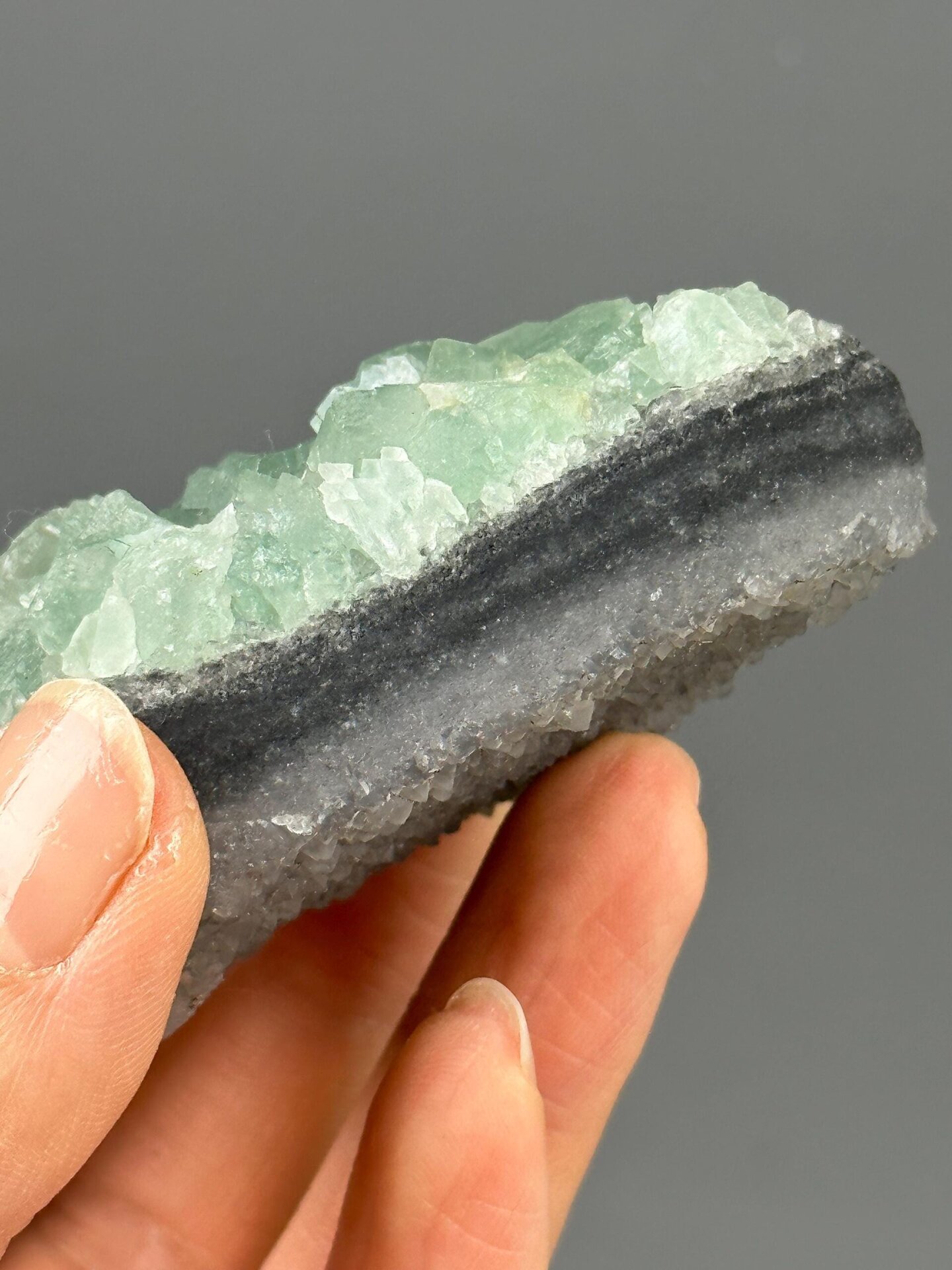 Full green fluorite quartz specimen on white background