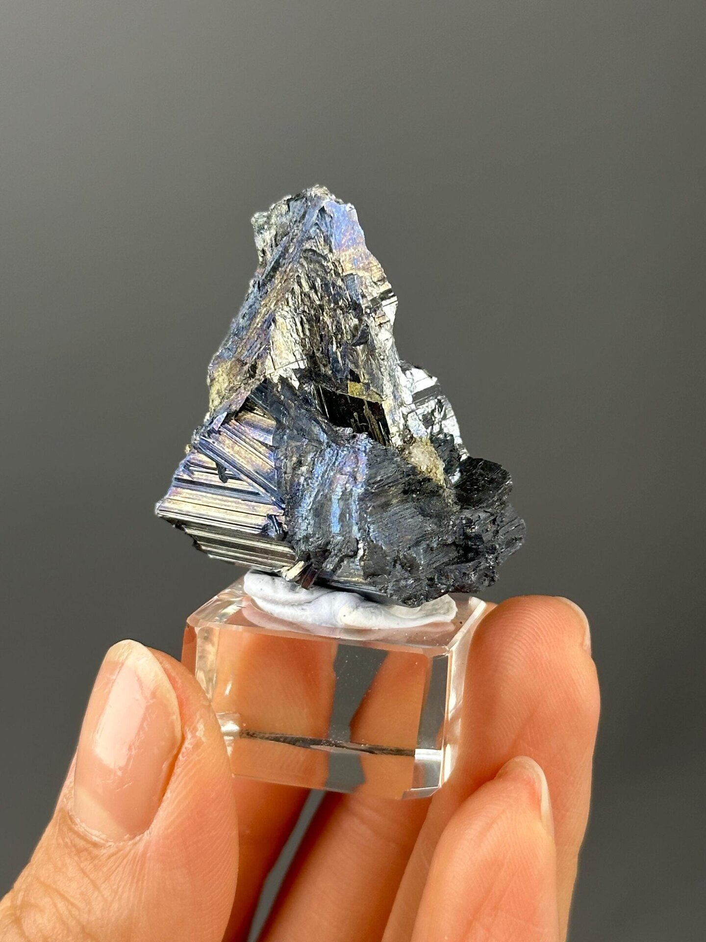 Metallic stibnite crystal blades close-up detail