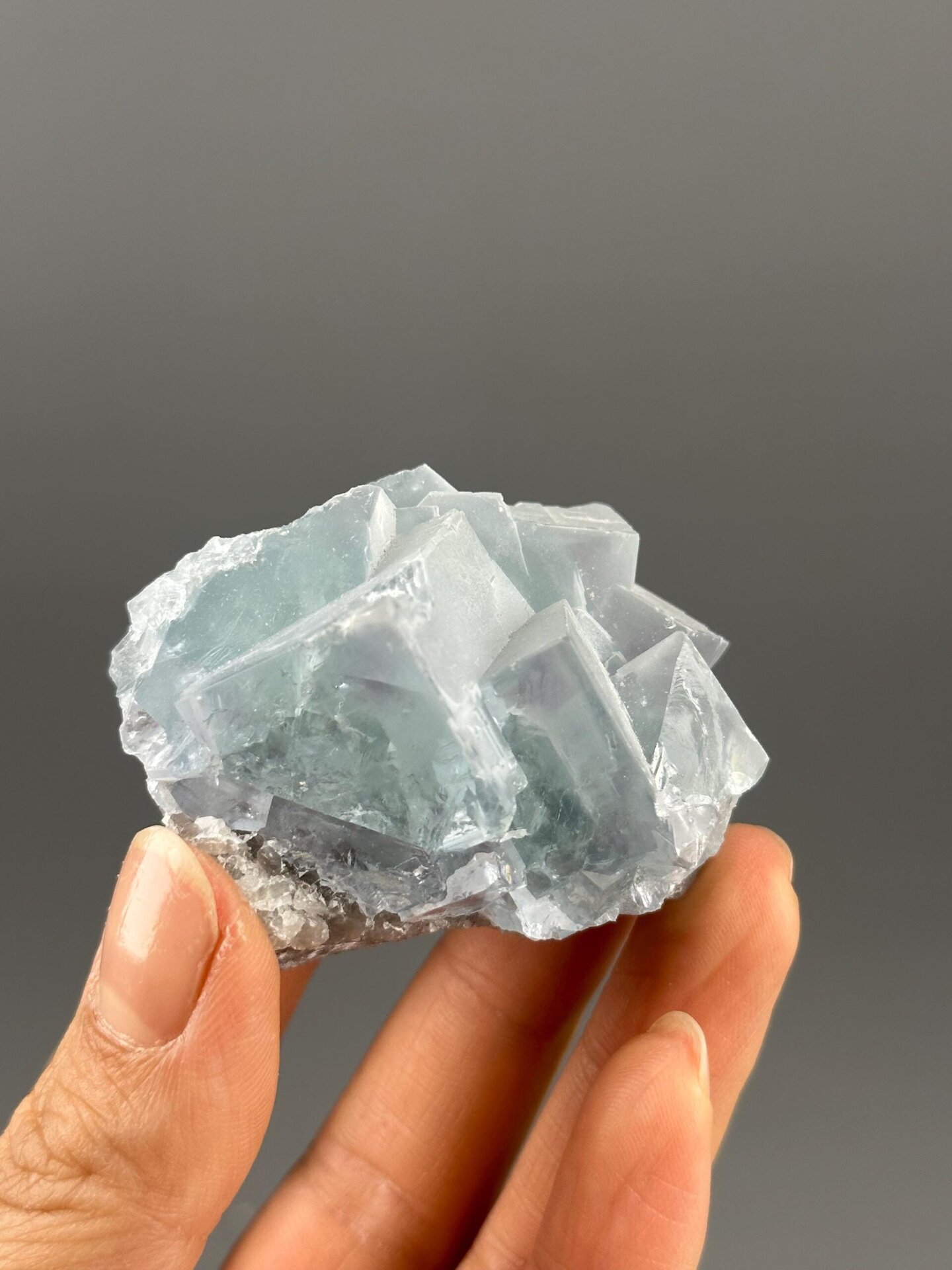 Front view of lake-green and purple twin fluorite from Yaogangxian