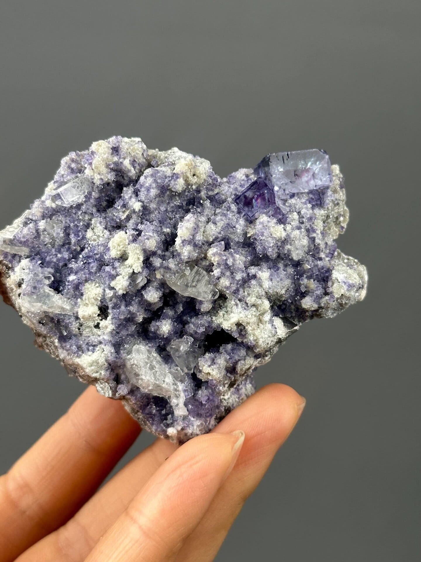 Side view of fluorite on white matrix, Yaogangxian Mine