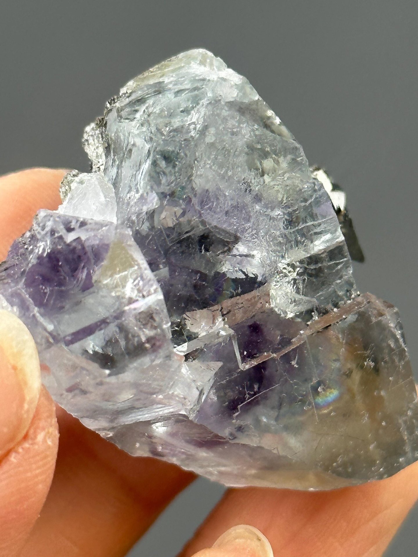 Fluorescent purple fluorite with golden pyrite, China