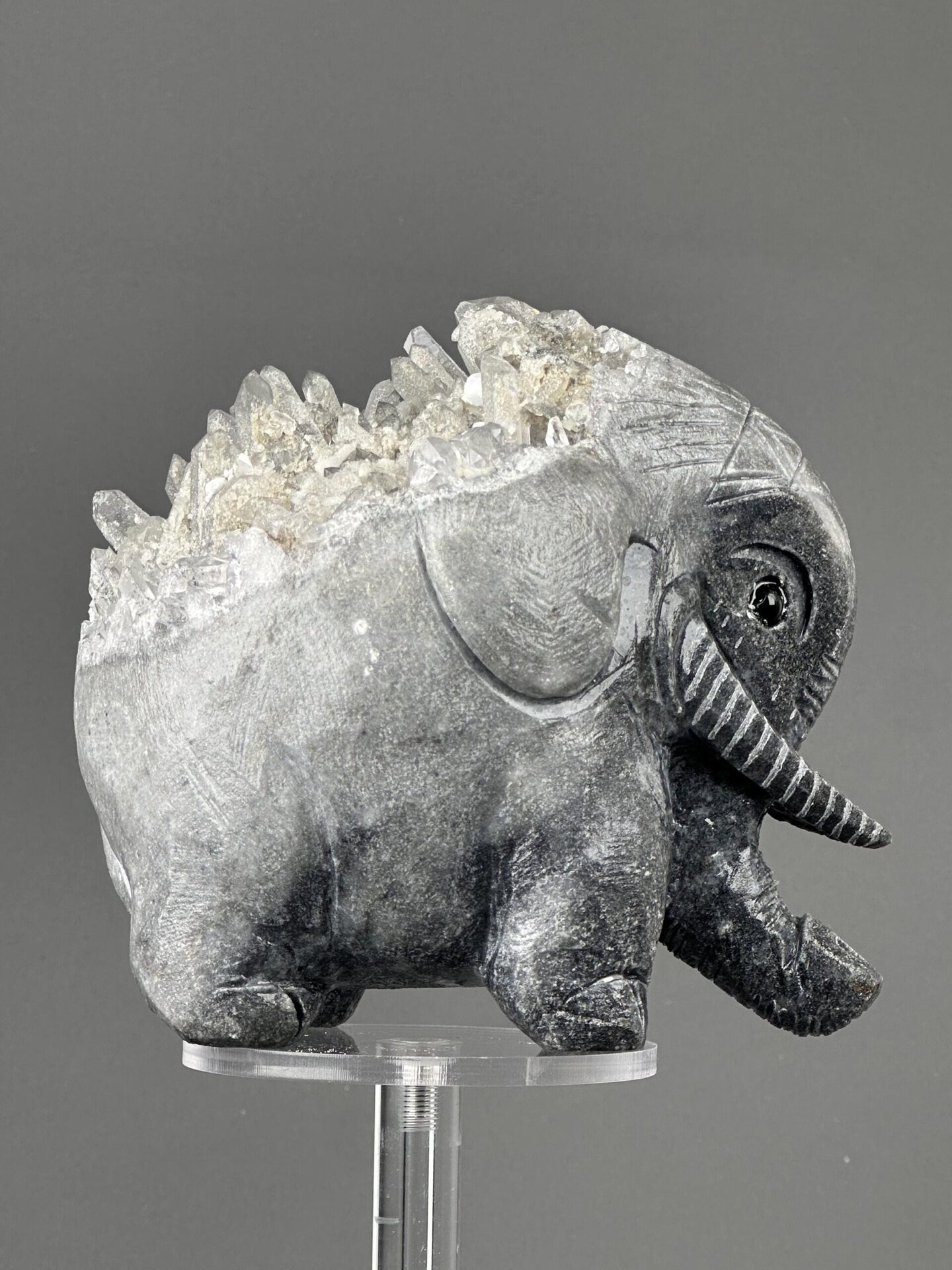 Front view of hand-carved mineral elephant sculpture
