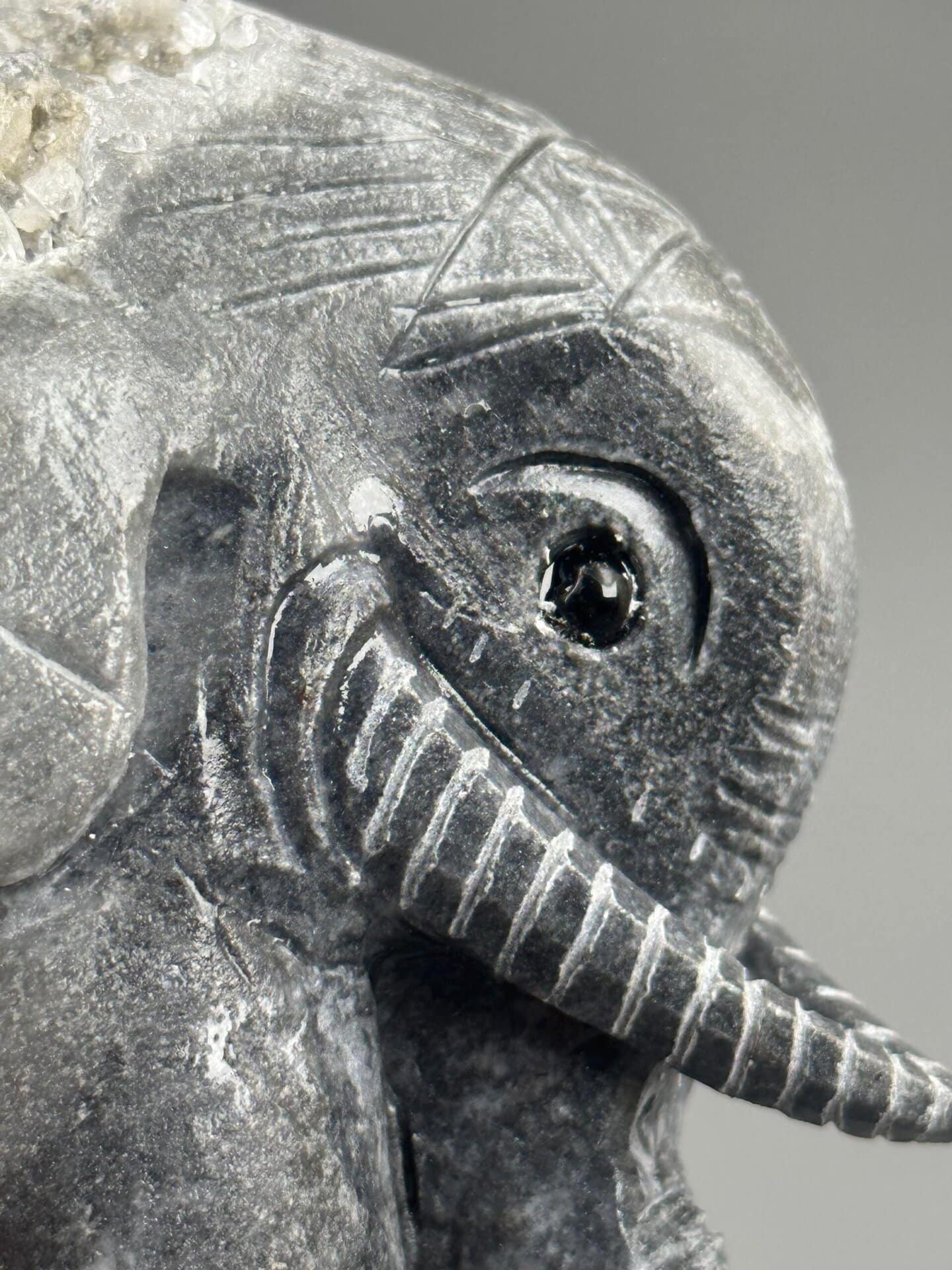 Back view of hand-carved crystal elephant from China