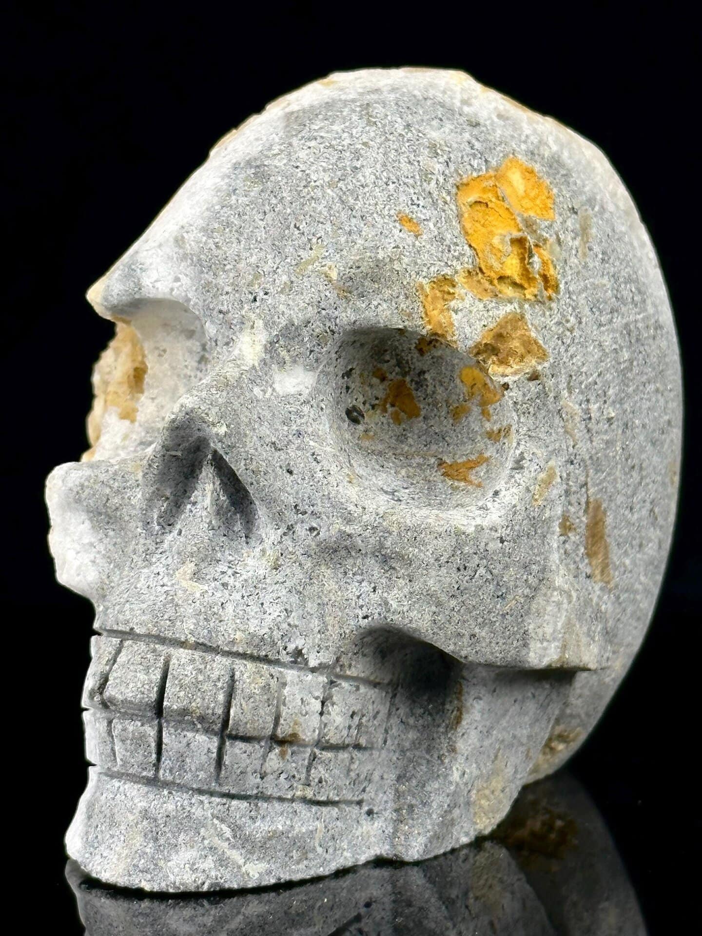 Side profile of extra-large quartz geode skull