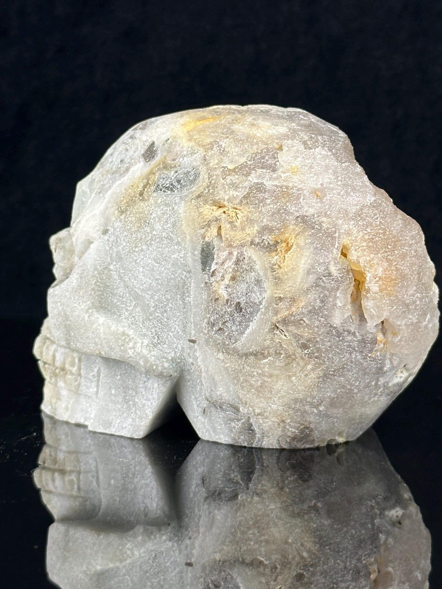 Back view of large hand-carved quartz geode skull