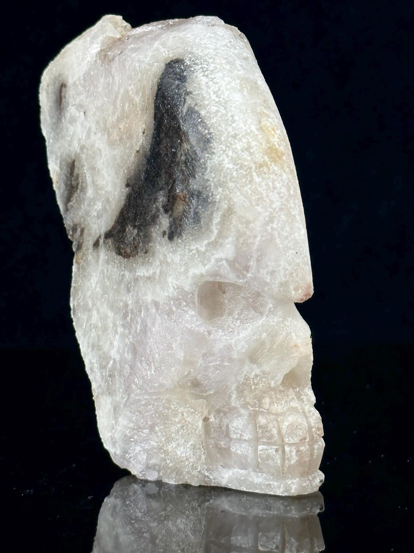 Front view of quartz skull showing druzy crystal detail
