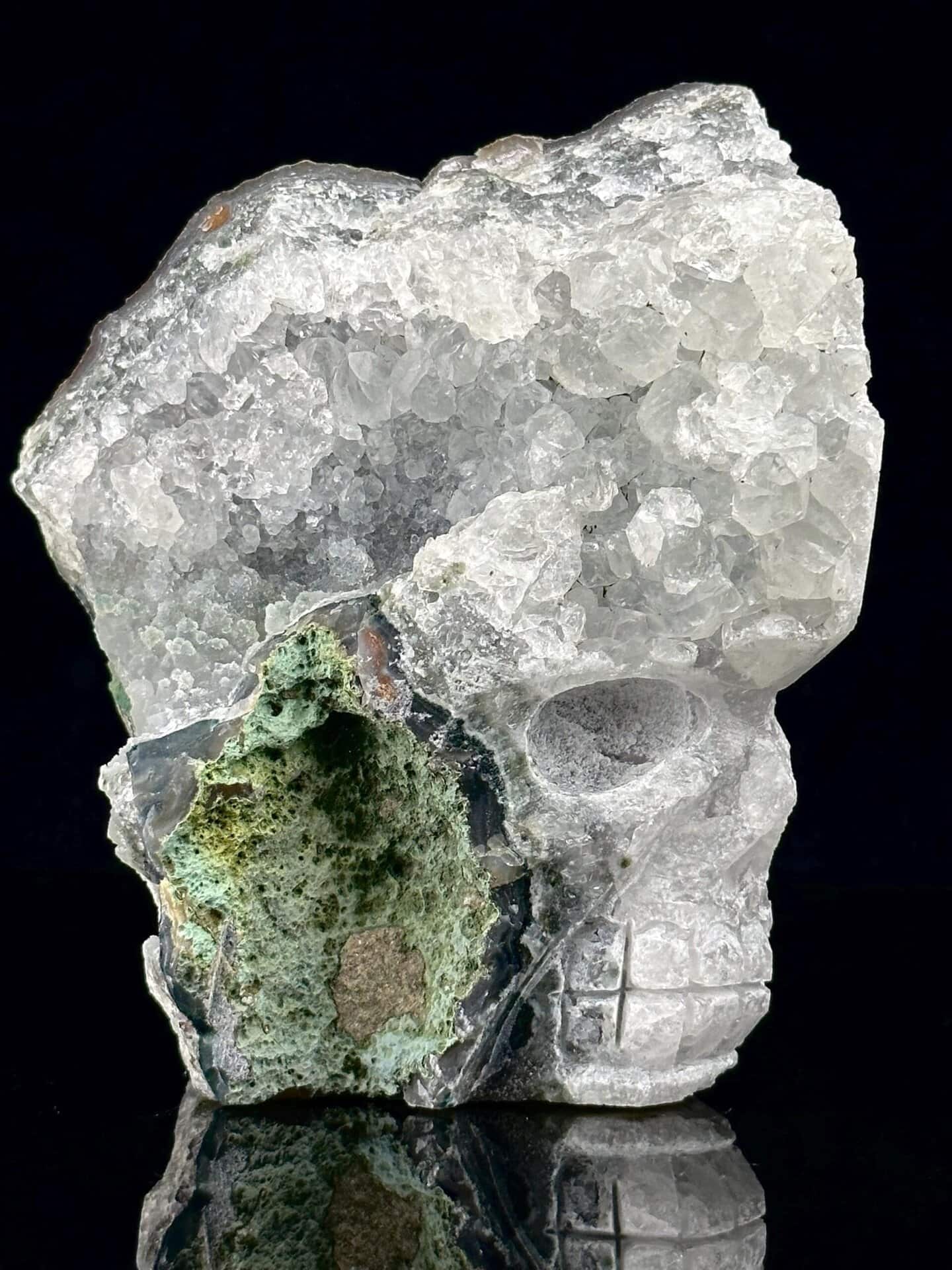 Side profile of quartz geode skull with malachite, 5×3×3.6 in