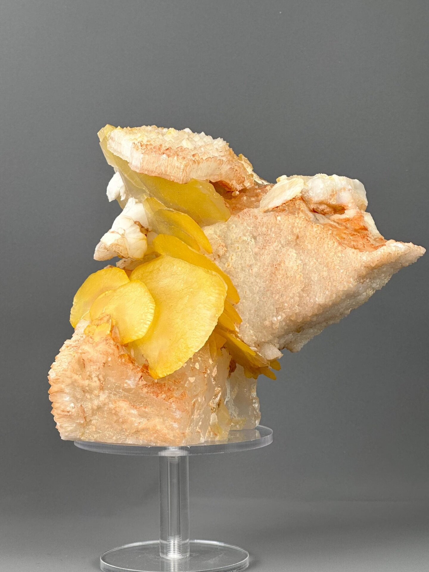 Back view of yellow potato calcite cluster specimen