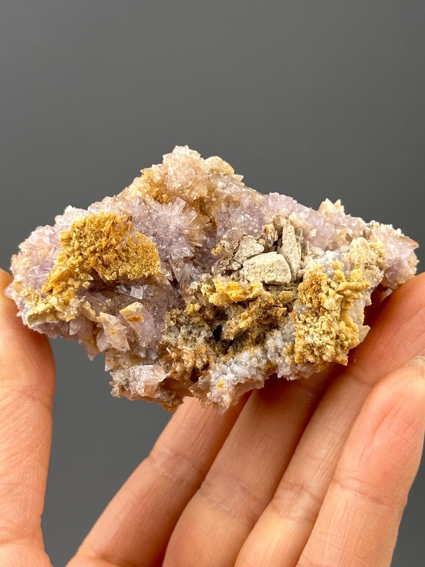 Front view of purple gypsum showing delicate floral arrangement