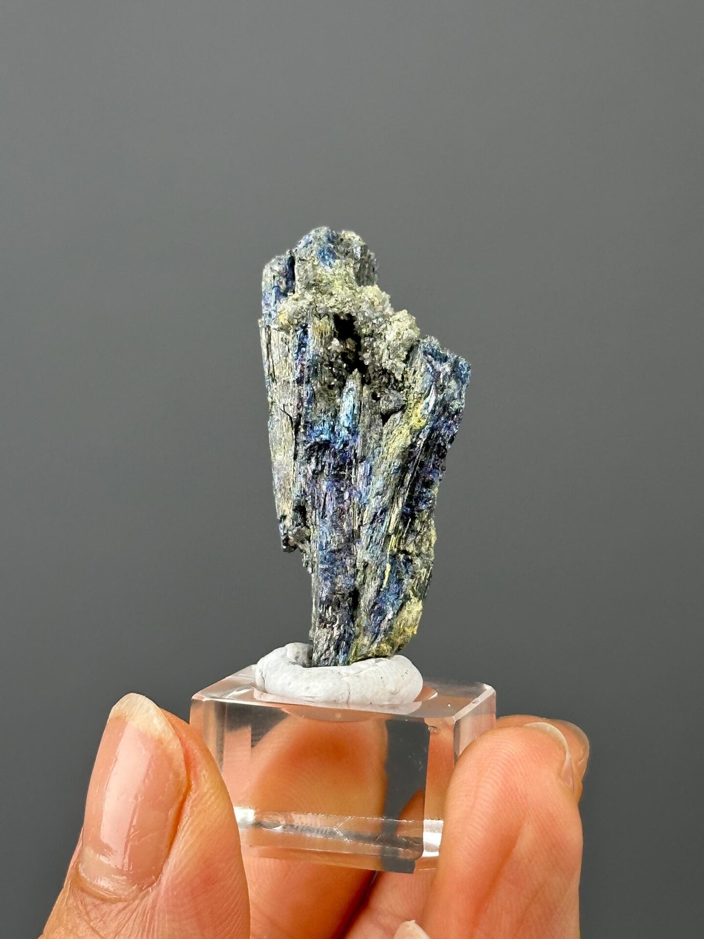 Side view of stibnite showing natural iridescence