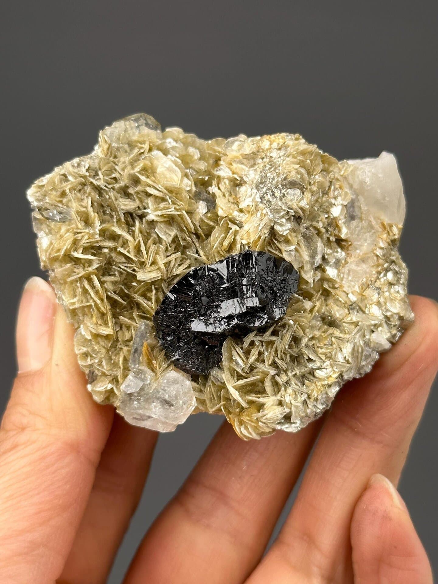 Cassiterite crystal with aquamarine and mica from Xuebaoding Mountain, Sichuan