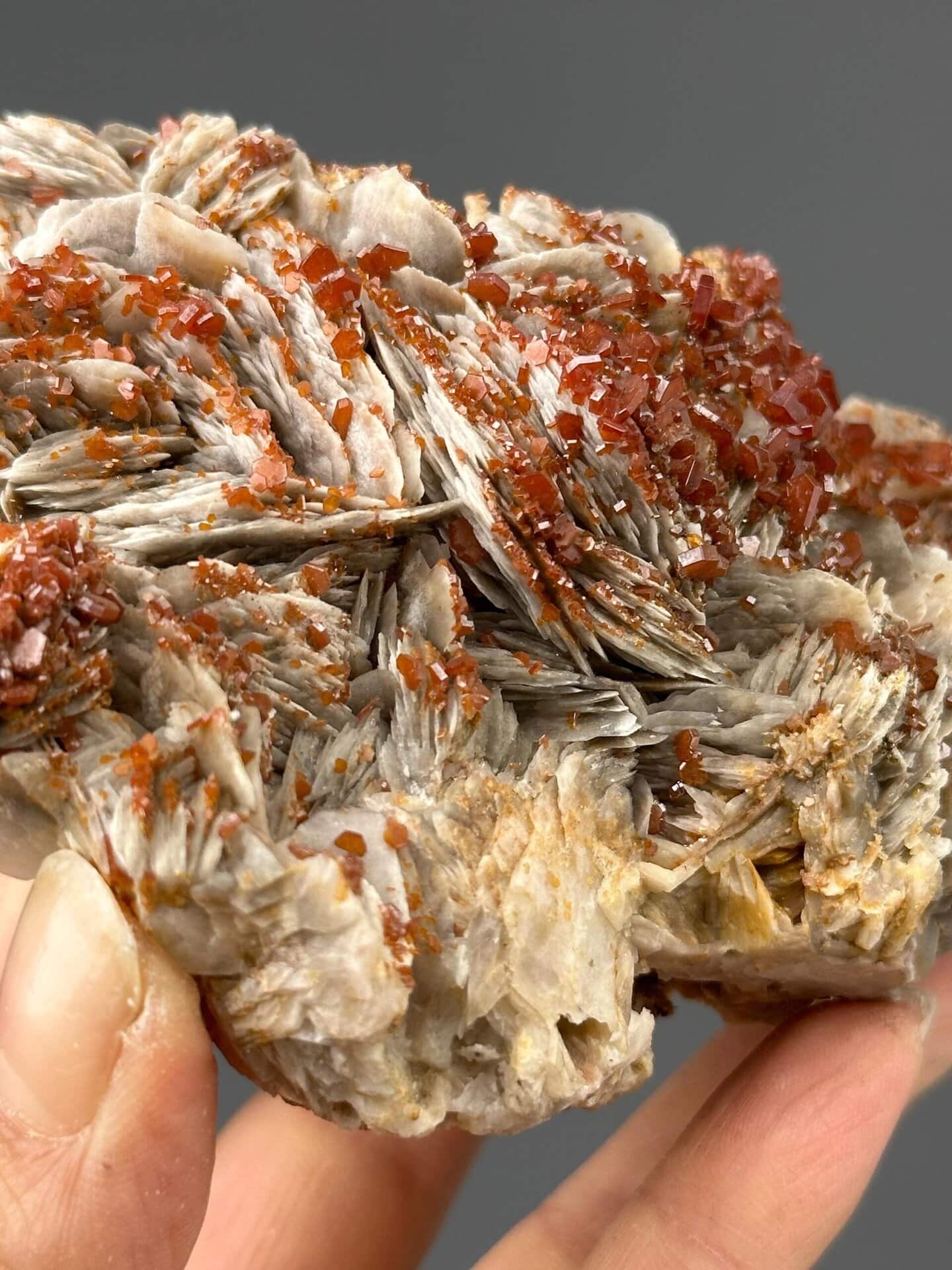 Detail of vanadinite crystal terminations on barite matrix