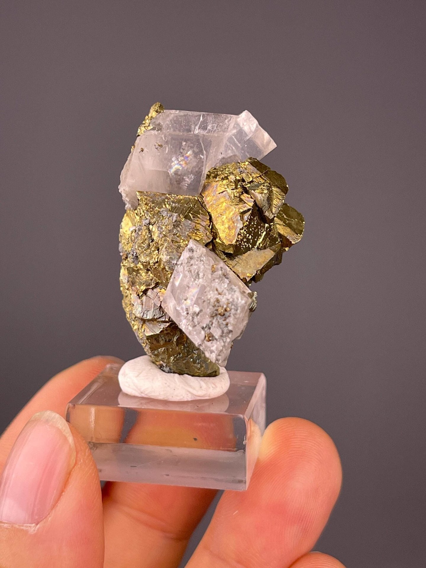Scale view of 1.5x1.0x0.9 in pyrite calcite cluster