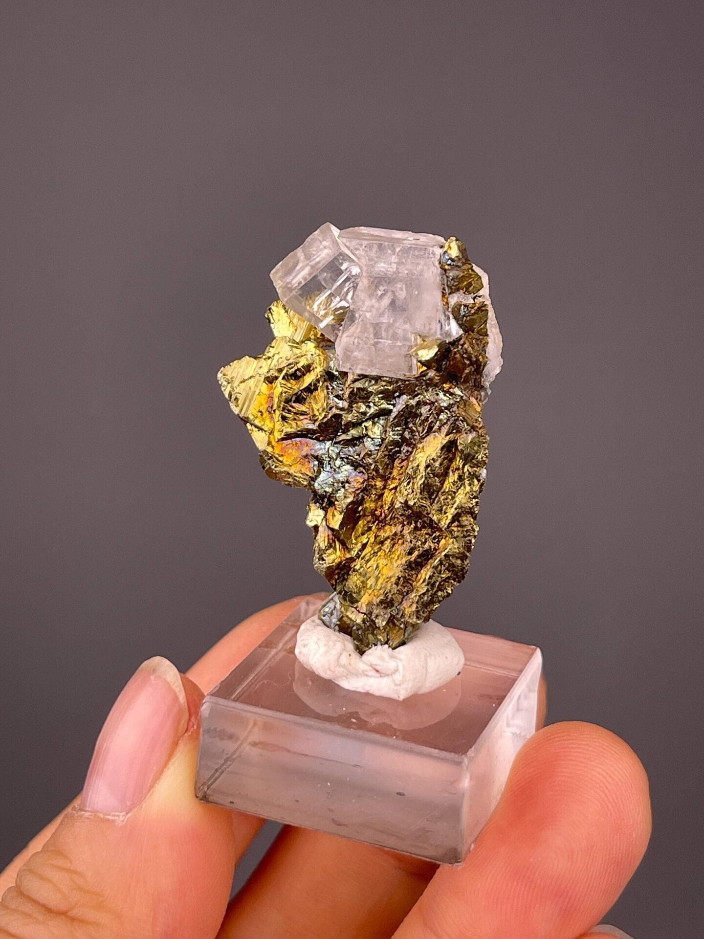 Pyrite calcite cluster showing metallic and vitreous luster