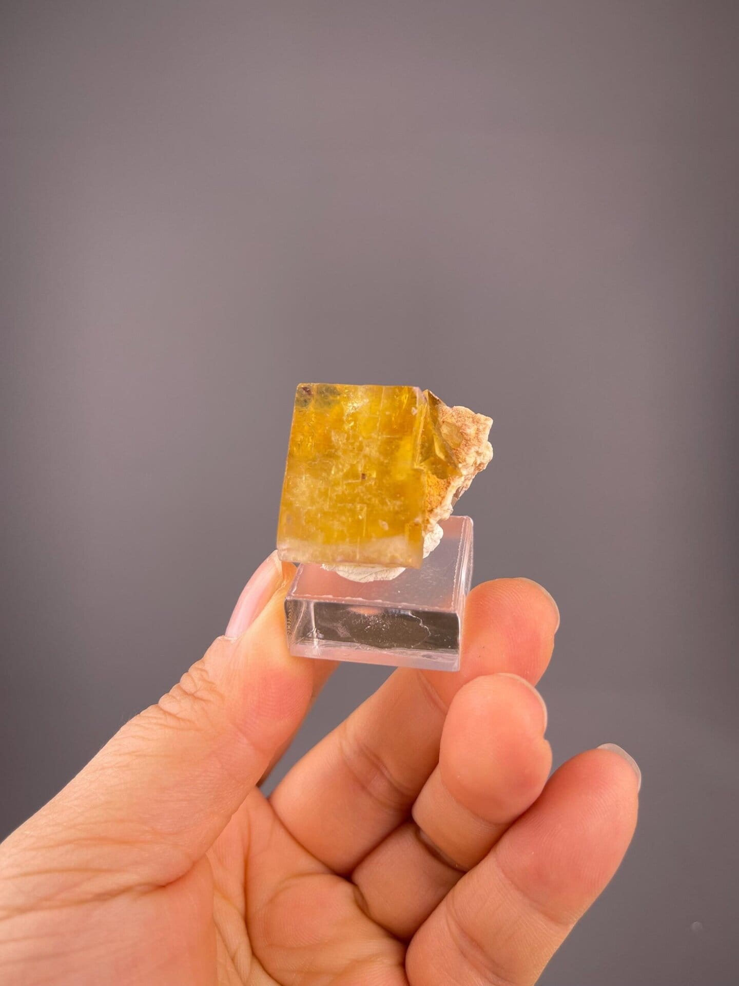 Near-perfect cubic fluorite with golden hue, Beijing
