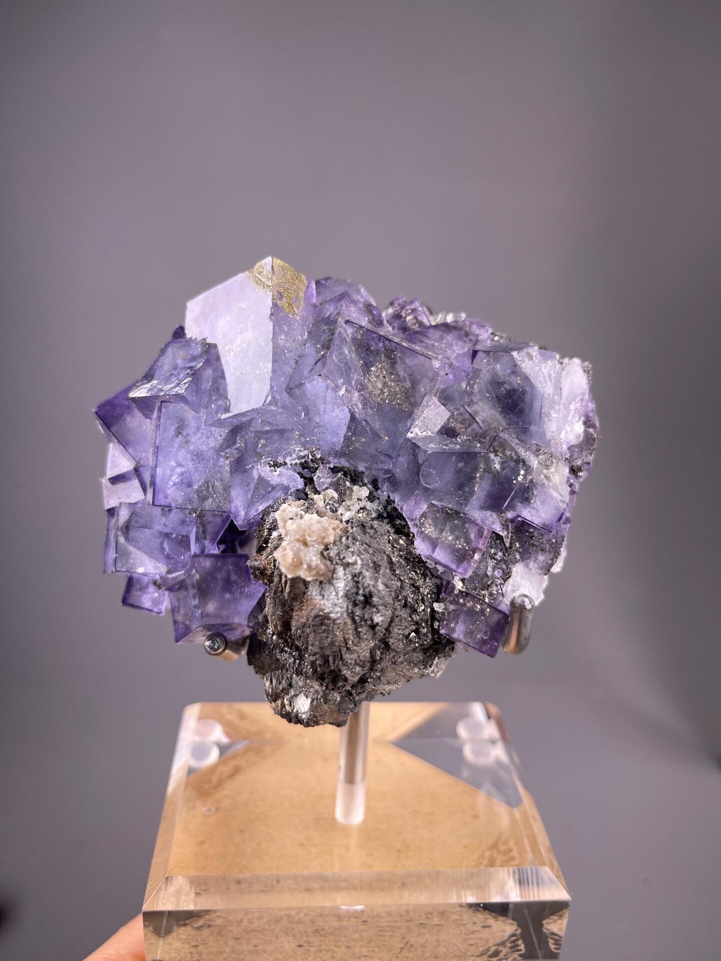 Purple phantom fluorite cluster with pyrite from Yaogangxian, Hunan