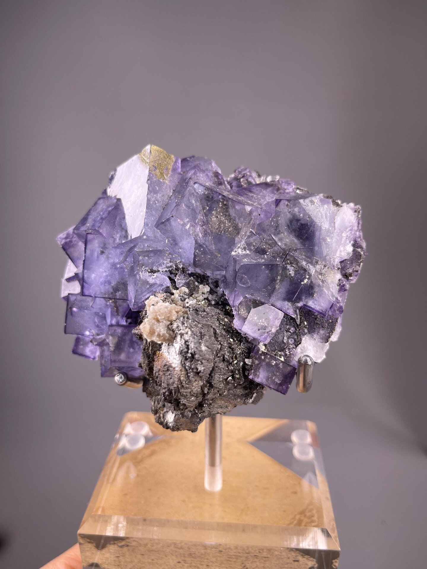 CaF₂ isometric purple phantom fluorite with FeS₂ pyrite