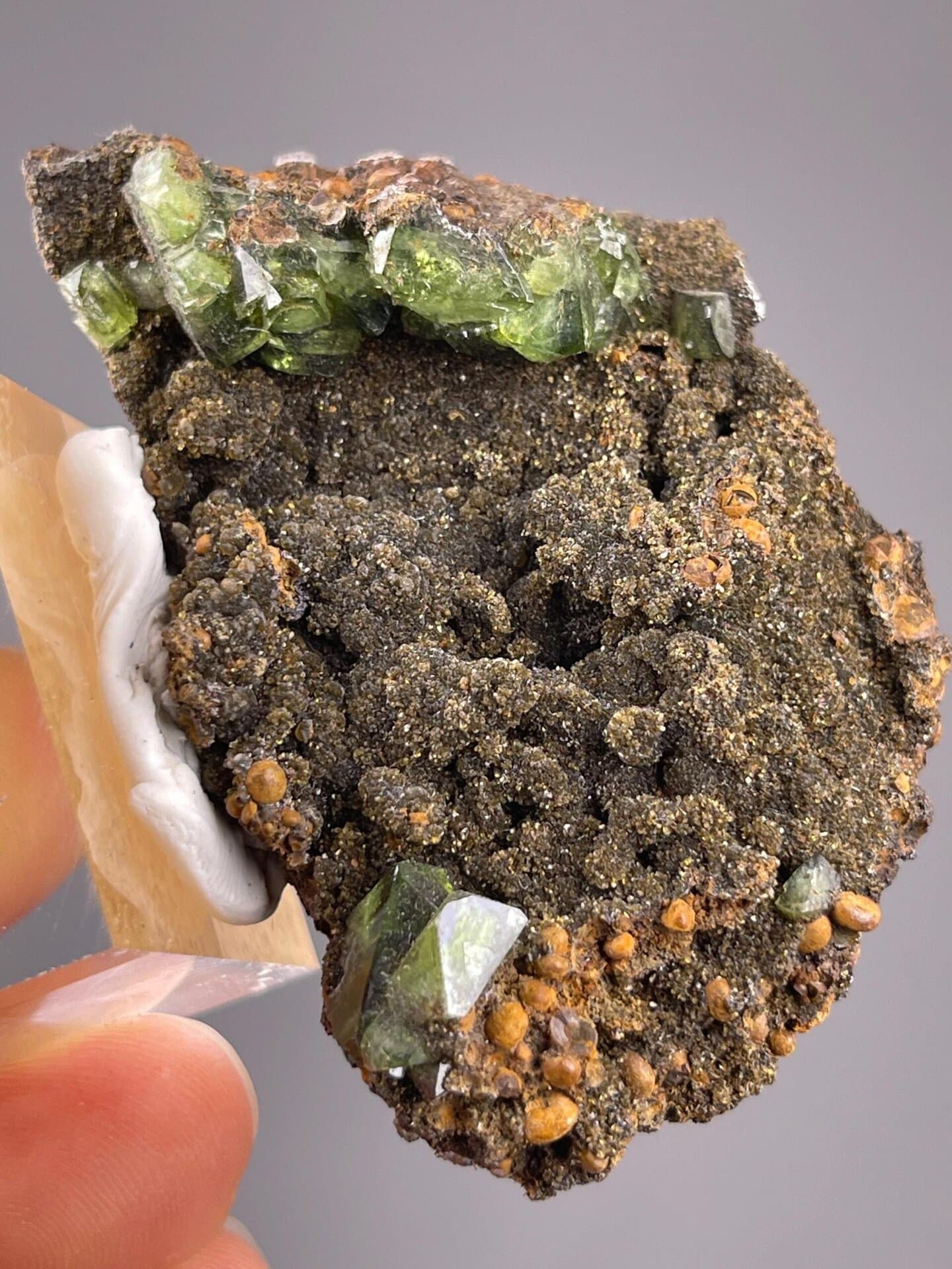 Raw Tanzania garnet cluster with vivid green coloration