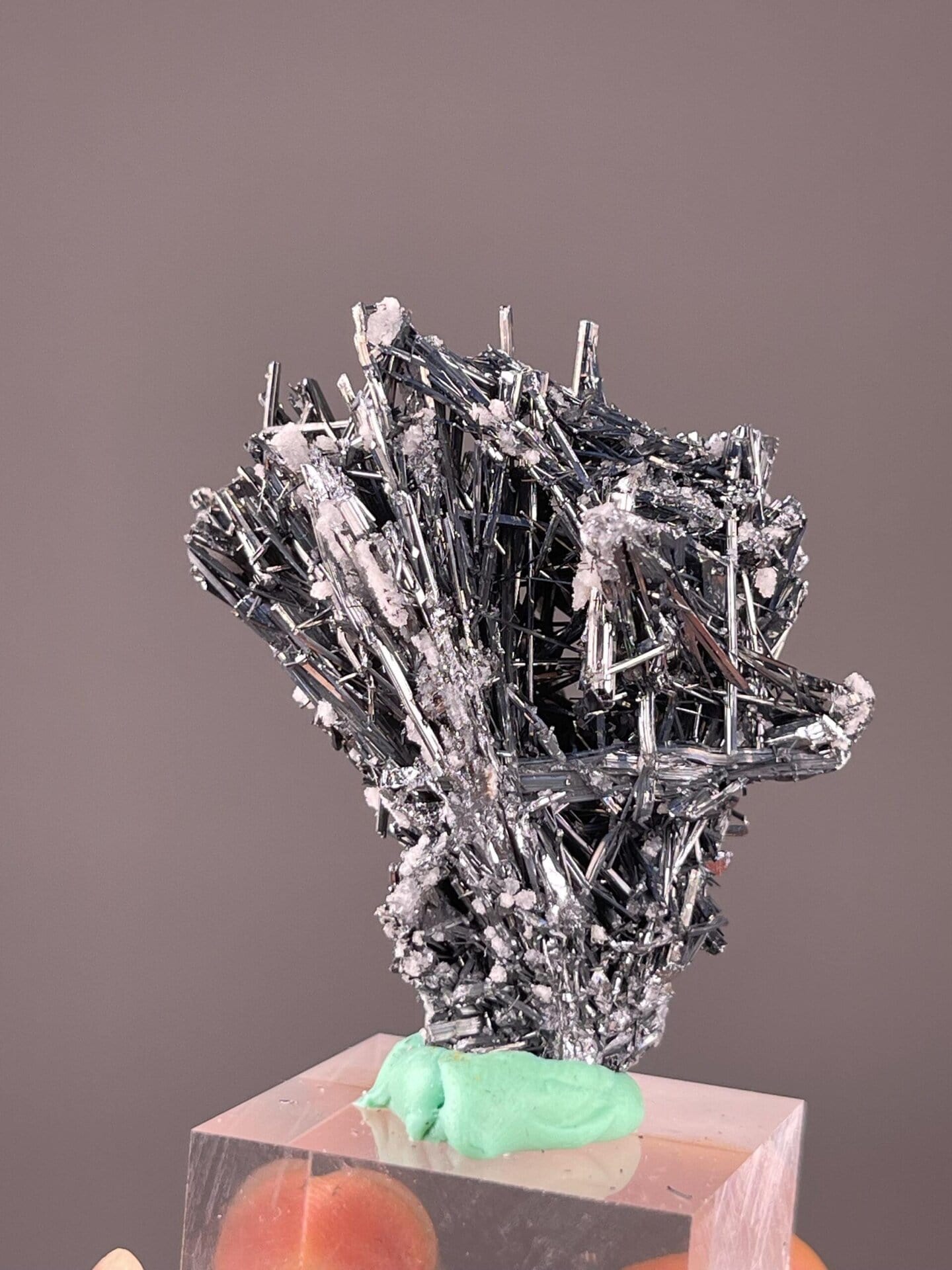 Stibnite prismatic crystal associated with calcite, Hunan