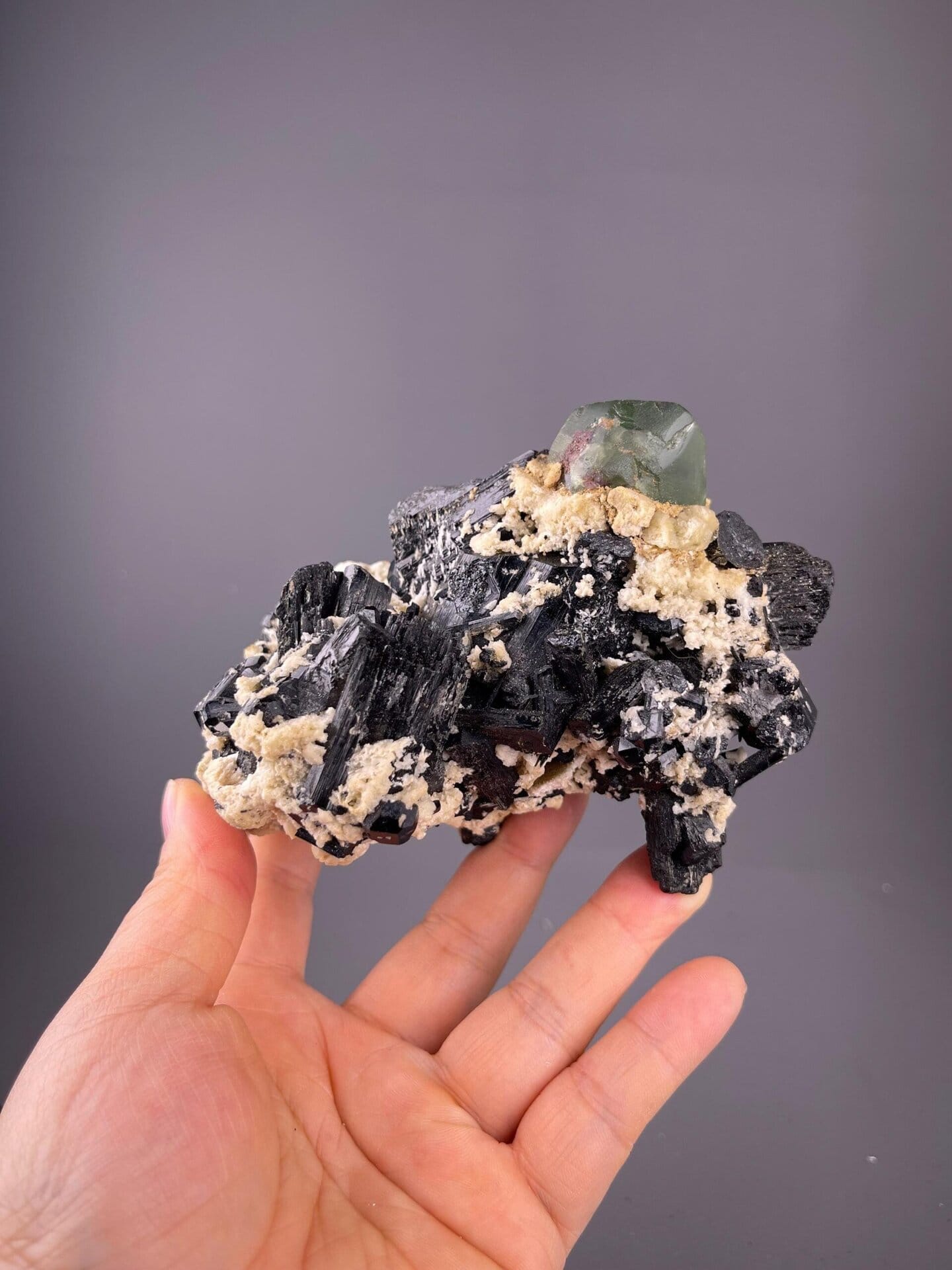 Trigonal borosilicate tourmaline with green CaF₂ fluorite, Namibia