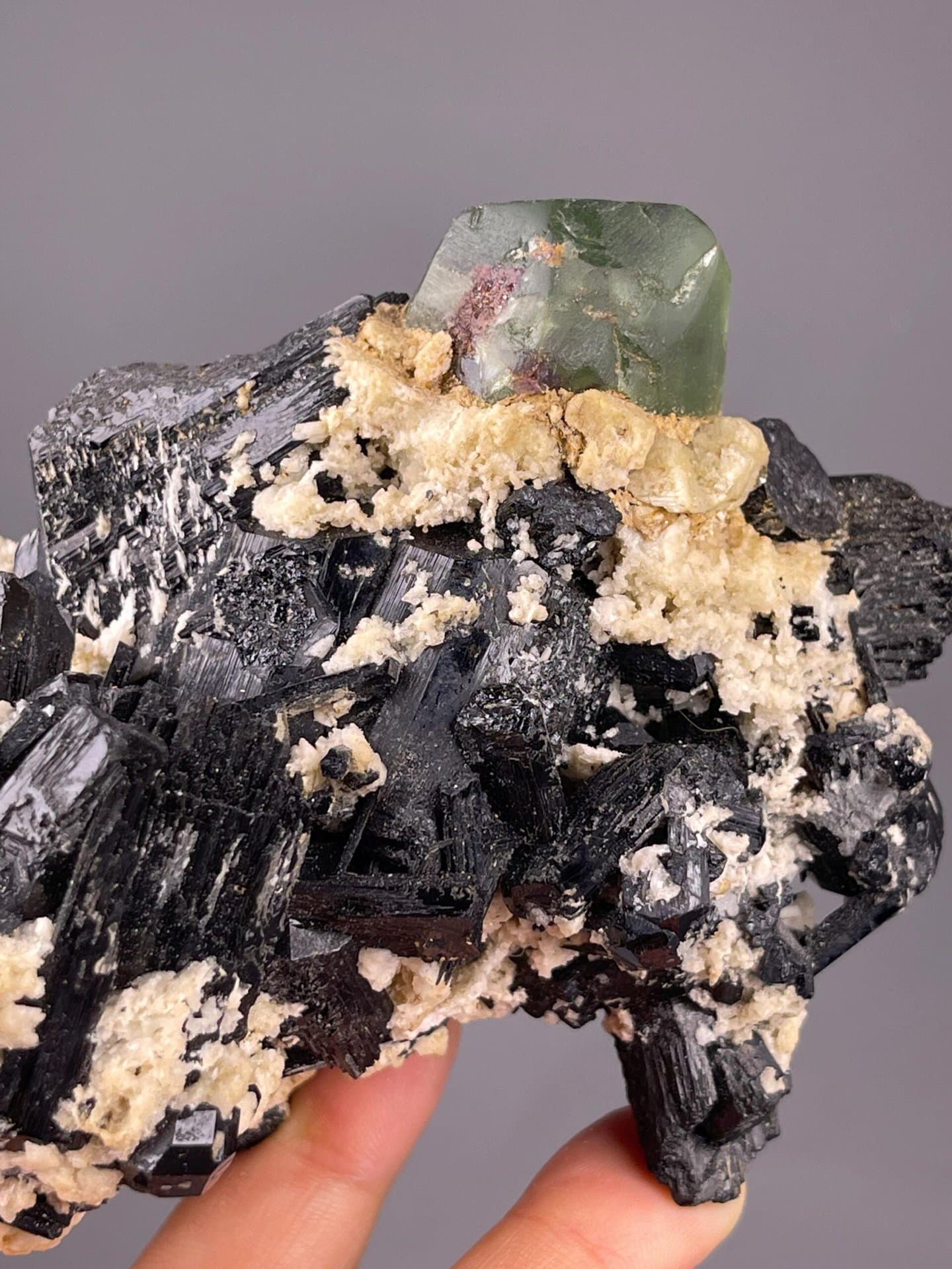 Jet-black striated tourmaline prisms with green fluorite, Namibia